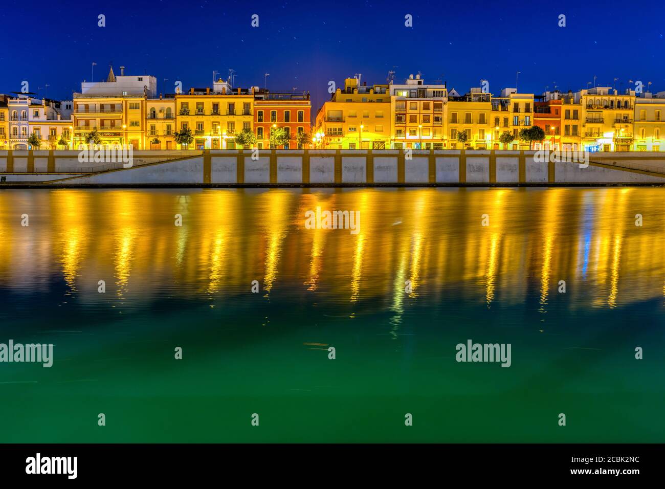 Betis street by the Guadalquivir river at night, Seville, Spain. Stock Photo