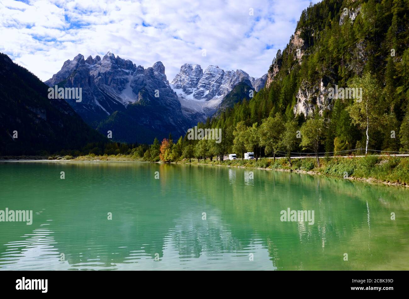 Dolomites mountains(Monte Cristallo) in South Tirol, Italy,emerald colored lake Duerrensee(Landro)in front,reflections on the water surface,autumn Stock Photo
