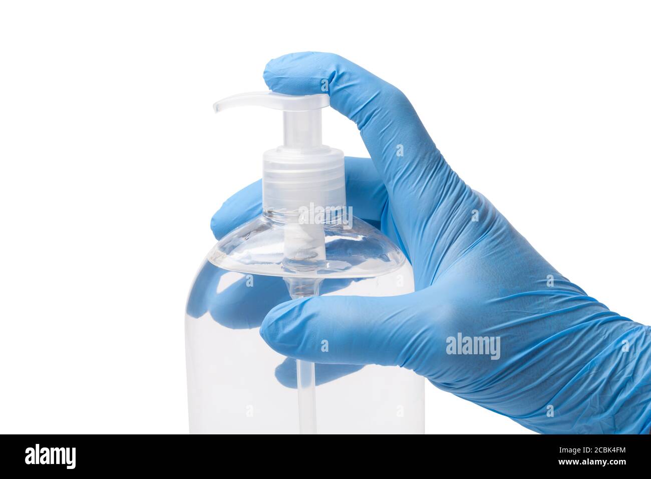 Human hand in latex glove and bottle with disinfectant isolated on white Stock Photo