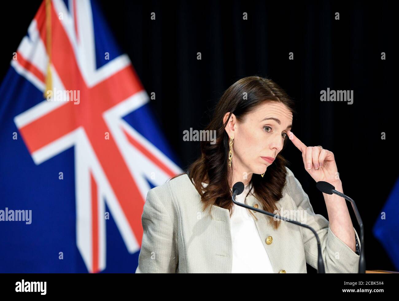 Wellington, New Zealand. 14th Aug, 2020. New Zealand Prime Minister Jacinda Ardern attends a press conference in Wellington, New Zealand, Aug. 14, 2020. New Zealand's largest city Auckland will remain in COVID-19 Alert Level 3 for 12 more days, with the rest of the country staying in Alert Level 2, as there are currently 36 active cases, 17 of which are linked to the recent community transmission in Auckland. Credit: Guo Lei/Xinhua/Alamy Live News Stock Photo