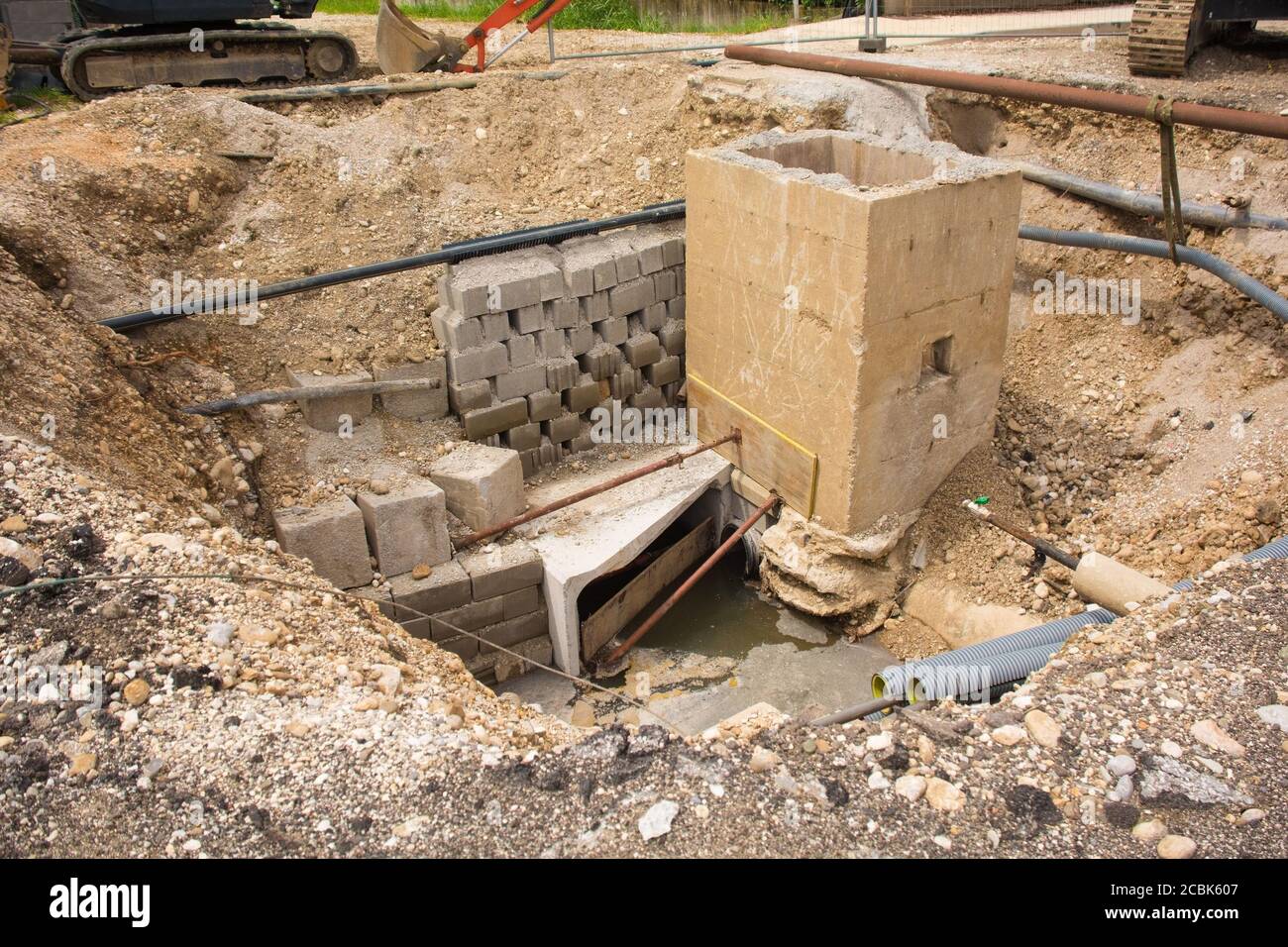 A sewer well trench, part of a sewer system replacement scheme in north west Italy Stock Photo