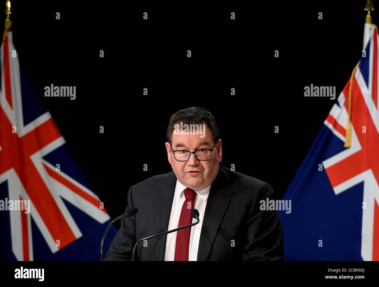Wellington, New Zealand. 14th Aug, 2020. New Zealand Finance Minister Grant Robertson speaks during a press conference in Wellington, New Zealand, Aug. 14, 2020. New Zealand's largest city Auckland will remain in COVID-19 Alert Level 3 for 12 more days, with the rest of the country staying in Alert Level 2, as there are currently 36 active cases, 17 of which are linked to the recent community transmission in Auckland. Credit: Guo Lei/Xinhua/Alamy Live News Stock Photo