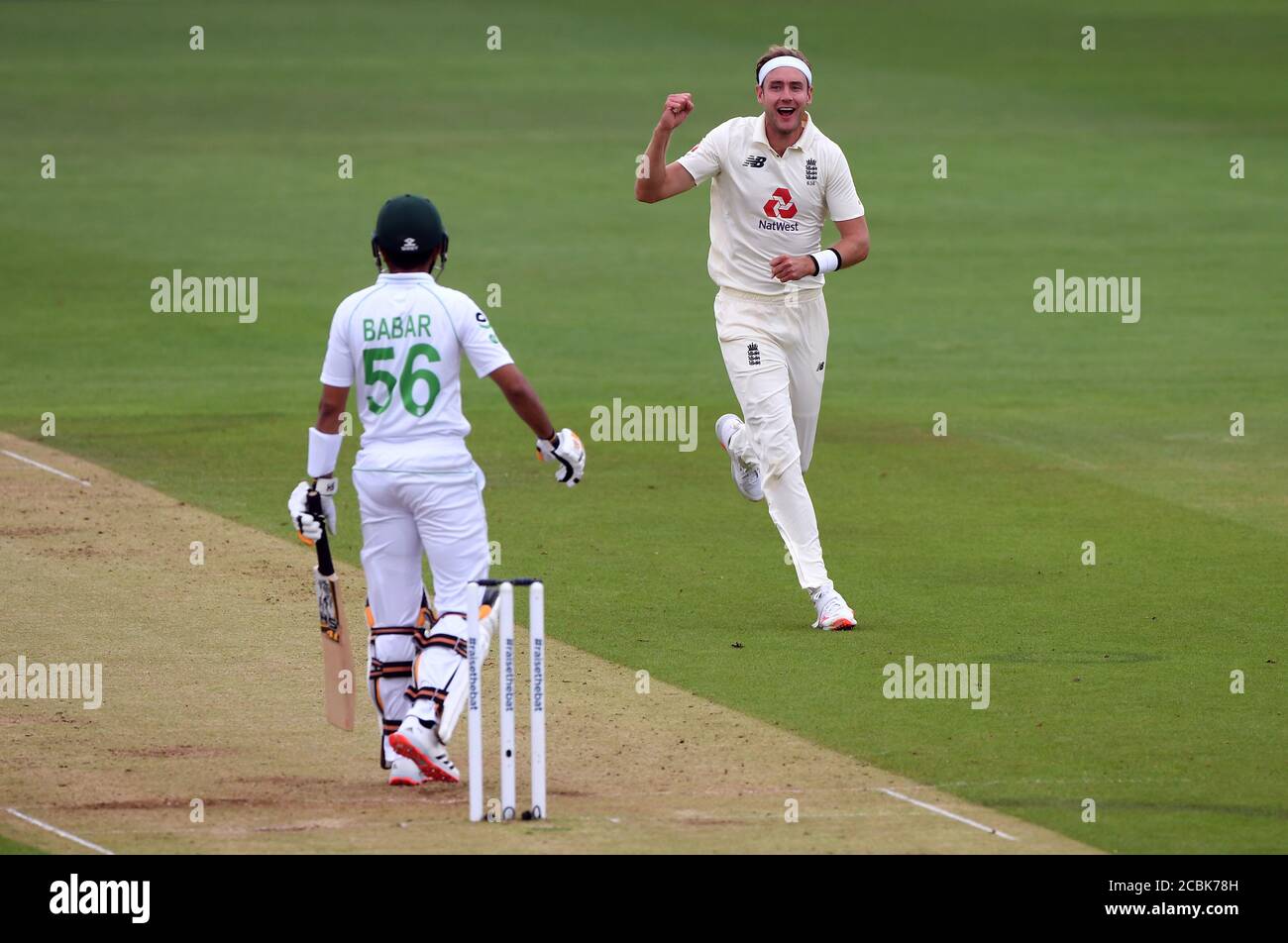 England's Stuart Broad celebrates taking the wicket of Pakistan's Babar Azam during day two of the Second Test match at the Ageas Bowl, Southampton. Stock Photo