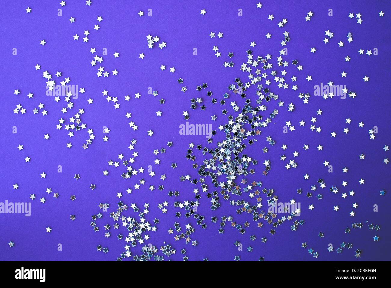 Purple background with silver stars sparkles Stock Photo