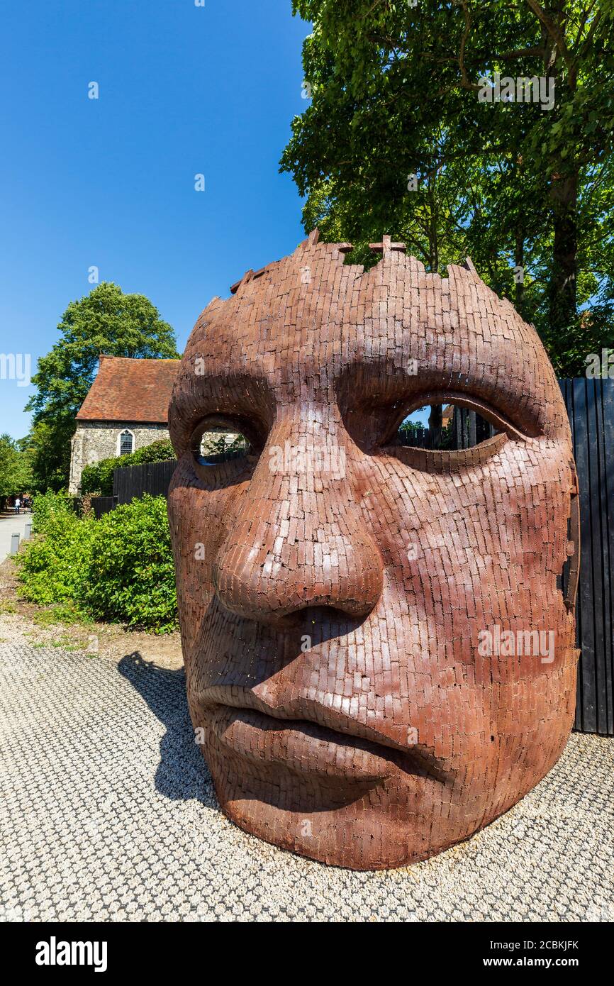 The Iron Face sculpture along the Great Stour outside the Marlowe Theatre, Canterbury, Kent, England Stock Photo