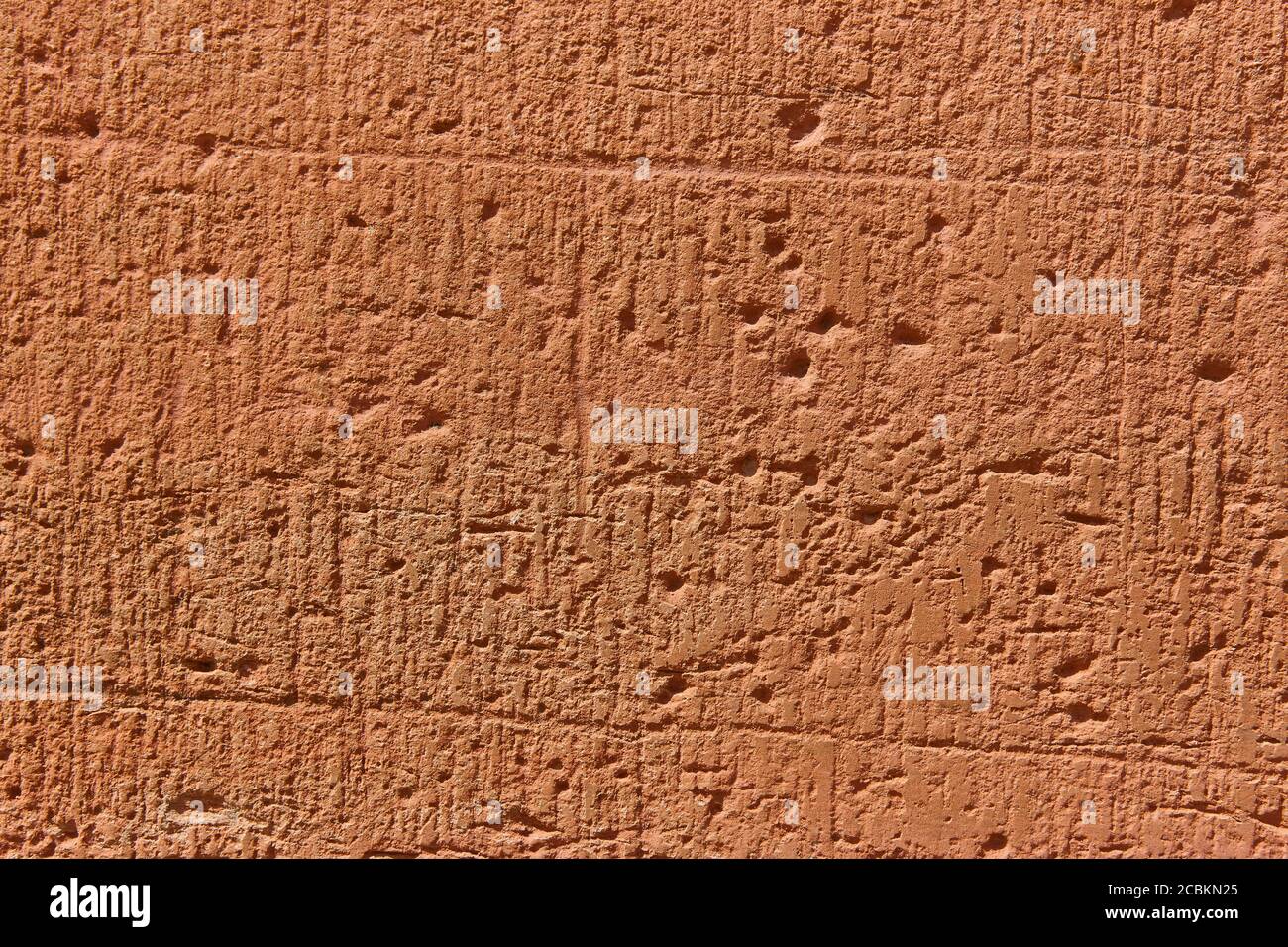 Textured stone background in warm tone. Horizontal copyspace Stock Photo