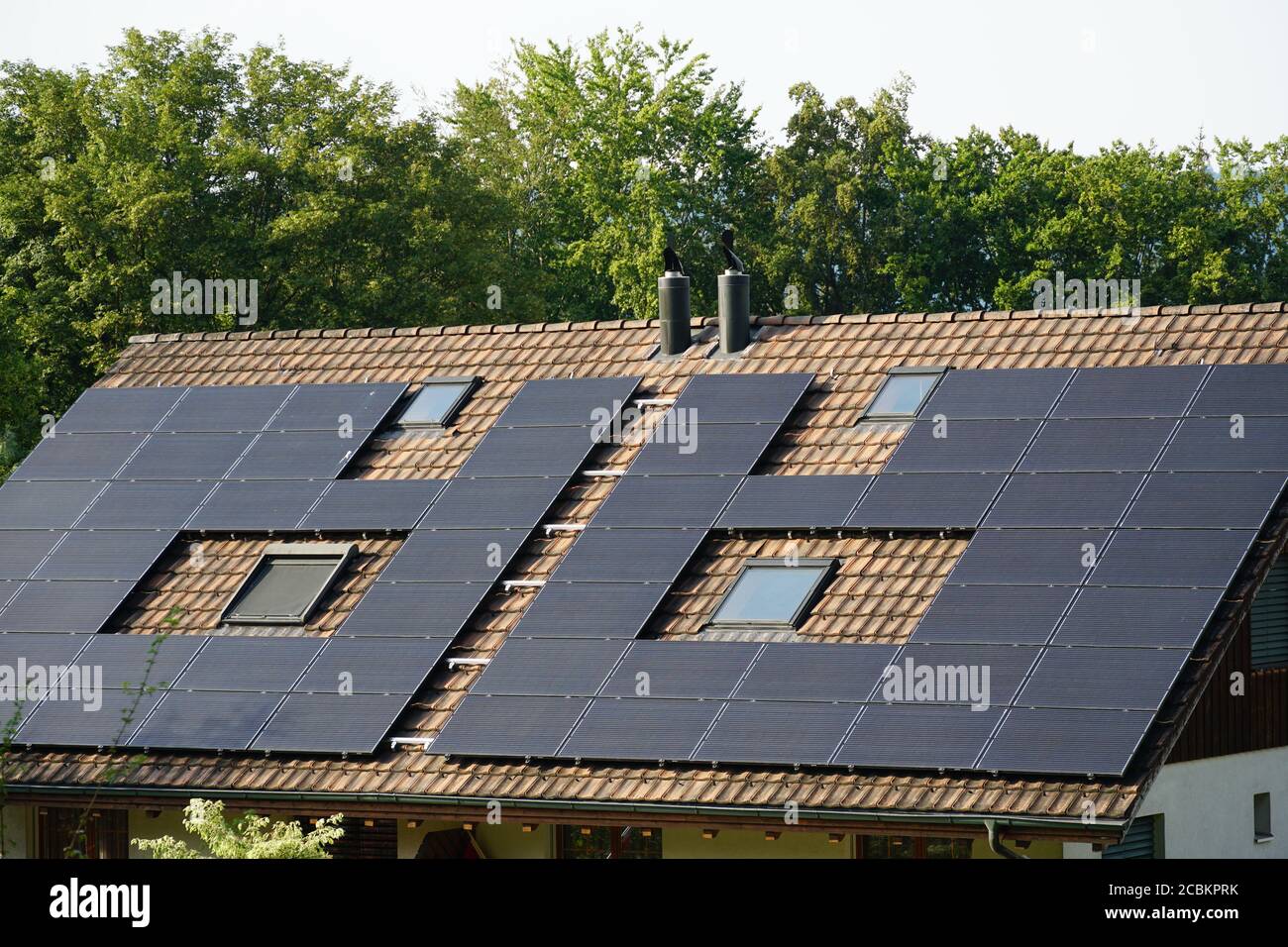 Flat plate or panels of solar collectors on the roof of the the family ...