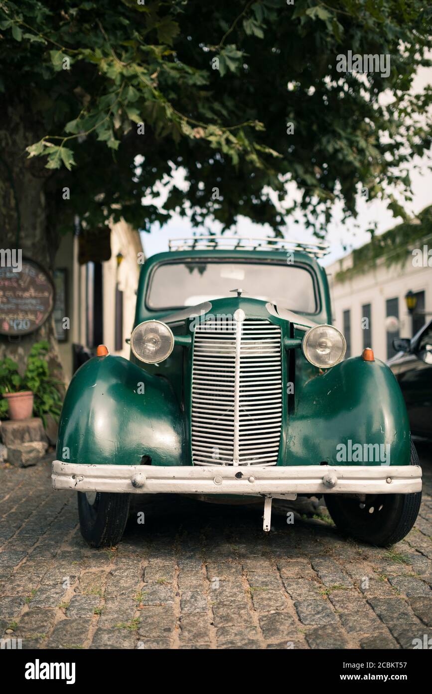 Green vintage car on cobbled street, Barrio Historico (Old Quarter), Colonia del Sacramento, Colonia, Uruguay Stock Photo