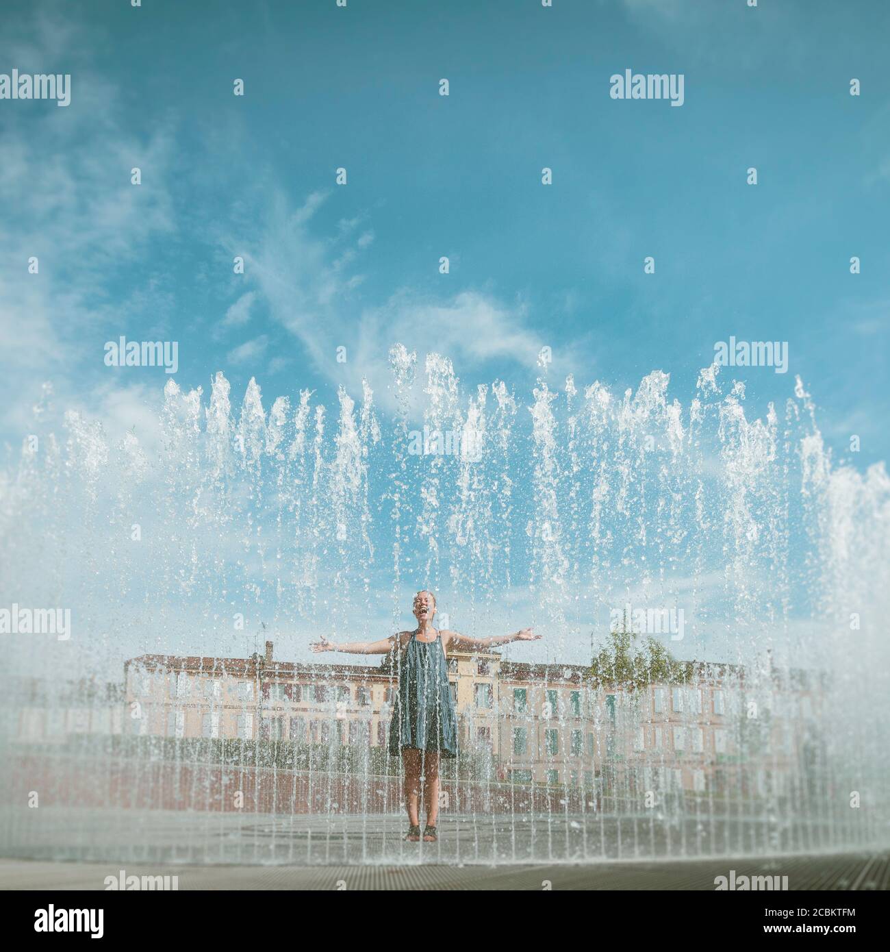 Woman and garden fountain, Palais de la Berbie, Albi, Midi Pyrenees, France Stock Photo