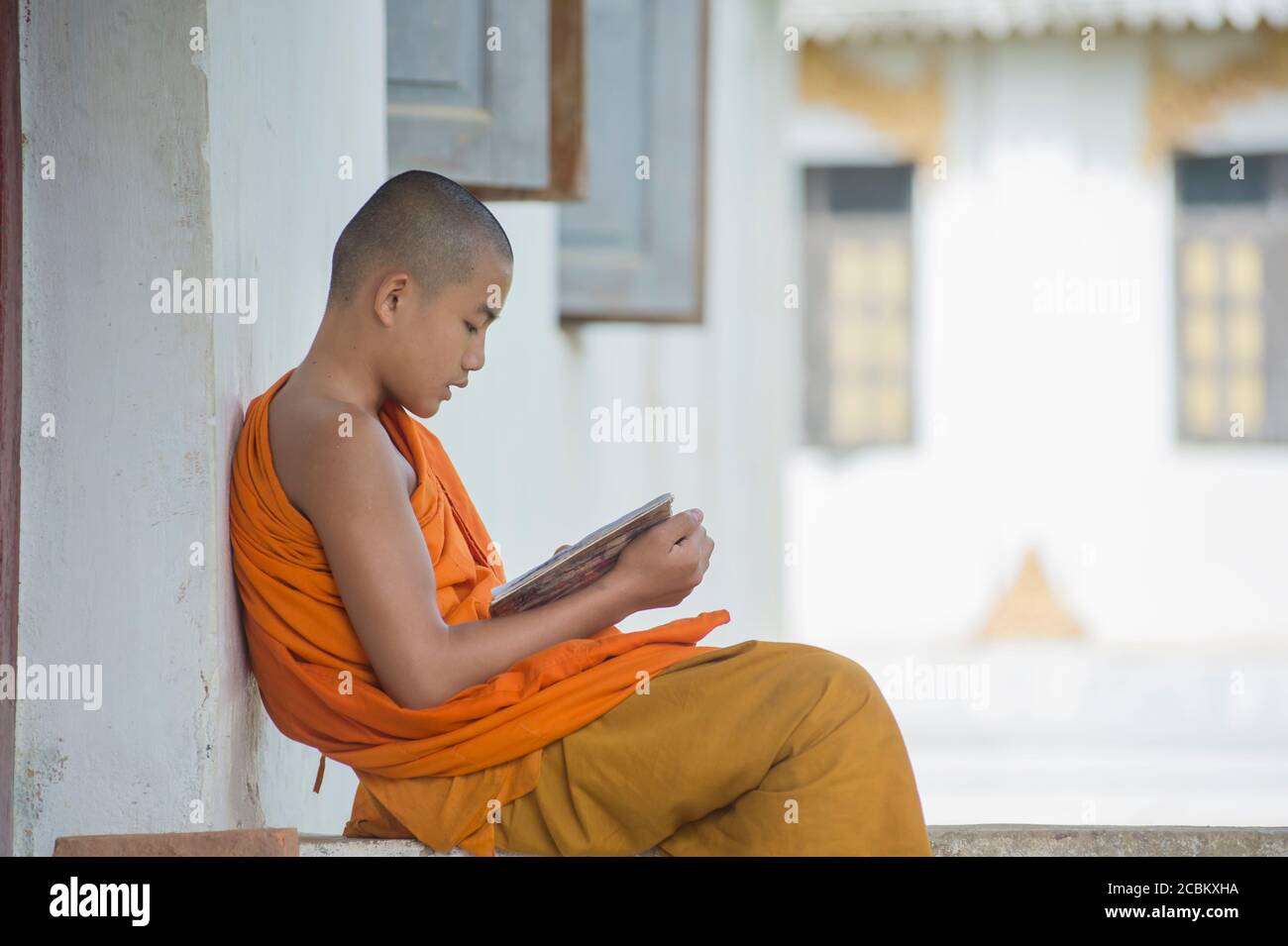 Monk reading, Shan State, Kengtung, Burma Stock Photo