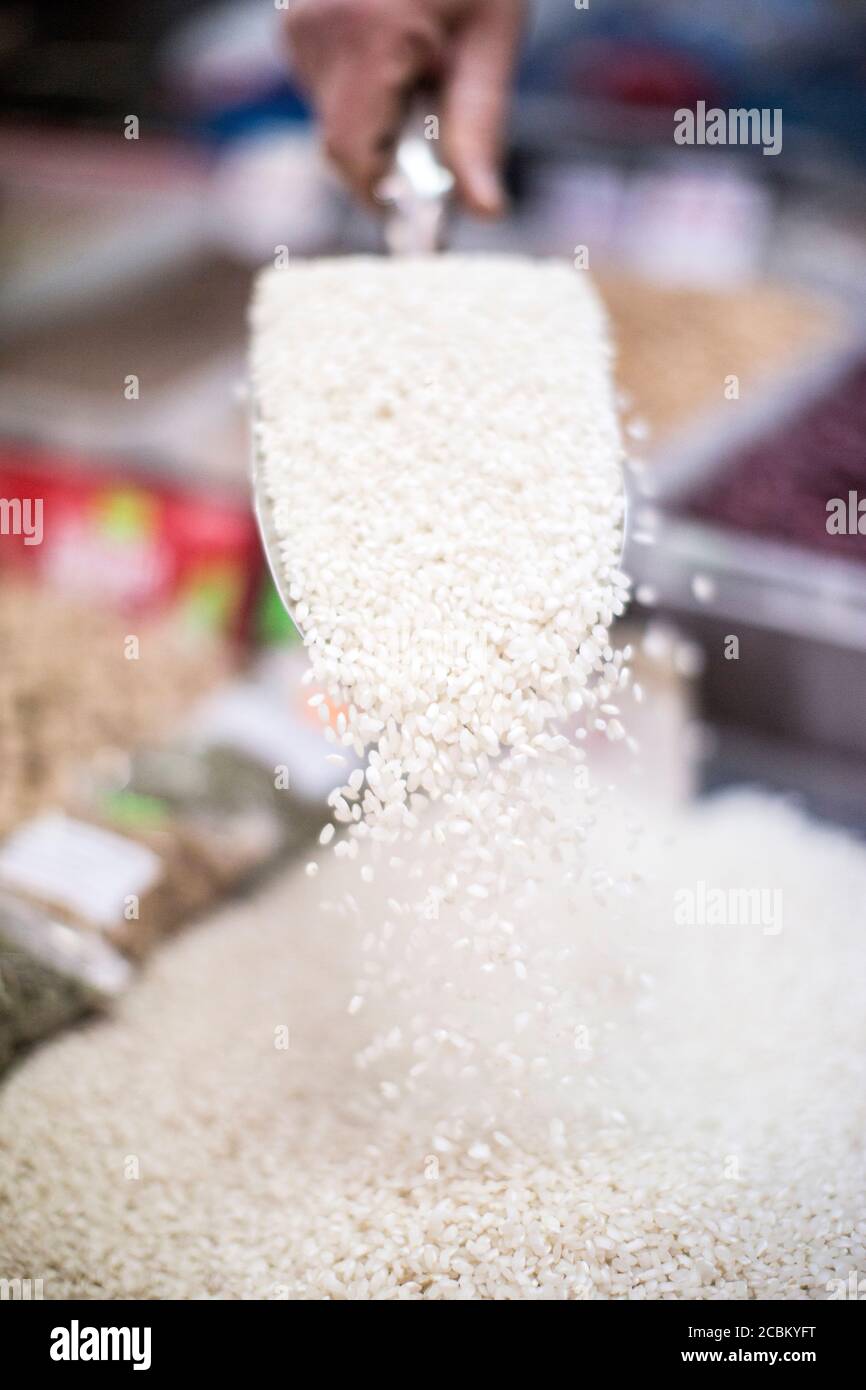 Paella rice in food market, close up Stock Photo Alamy