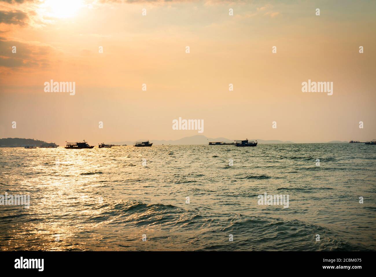 Boats on sea in distance, Koh Samet, Thailand Stock Photo