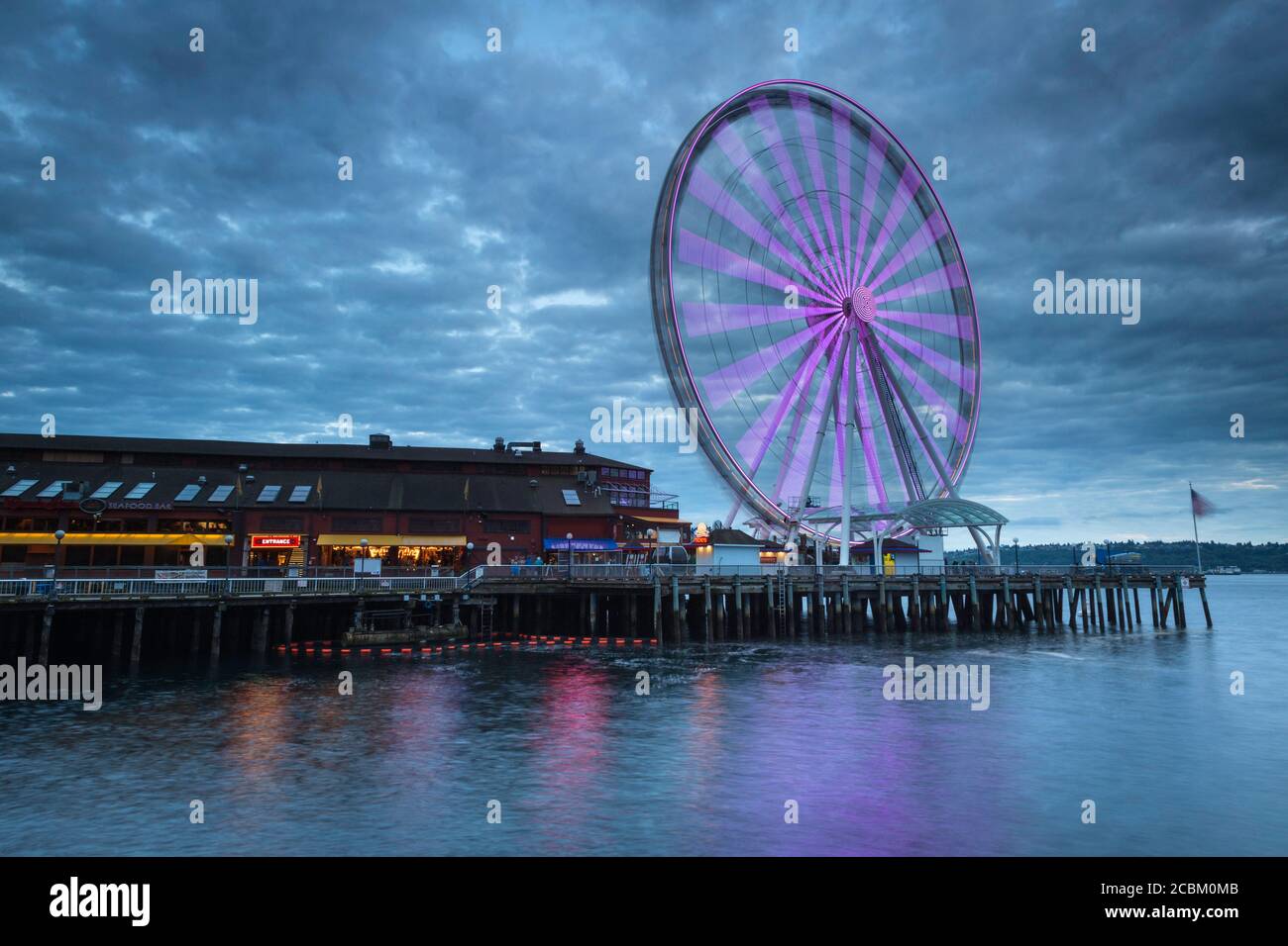 Seattle great wheel and waterfront at dusk, Seattle, Washington State, USA Stock Photo