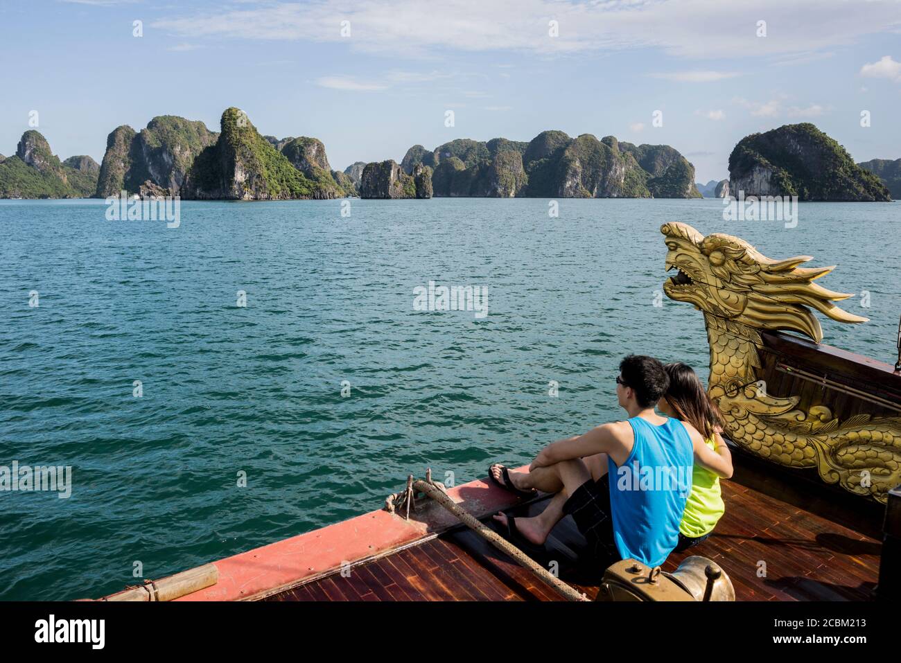 Couple enjoying view on cruise boat, Ha Long Bay, Vietnam Stock Photo