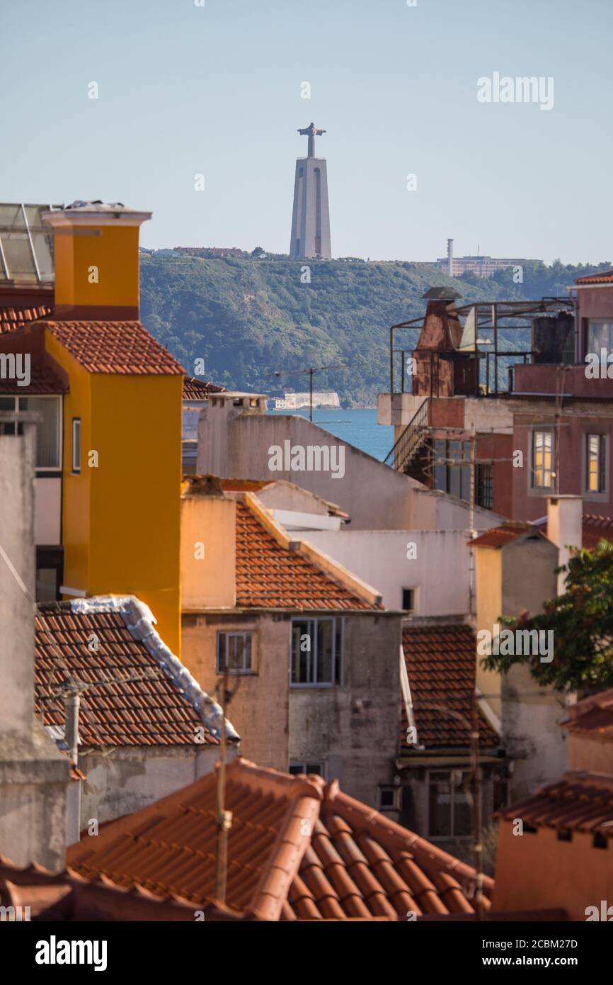 View of Sanctuary of Christ the King from above rooftops, Lisbon, Portugal Stock Photo