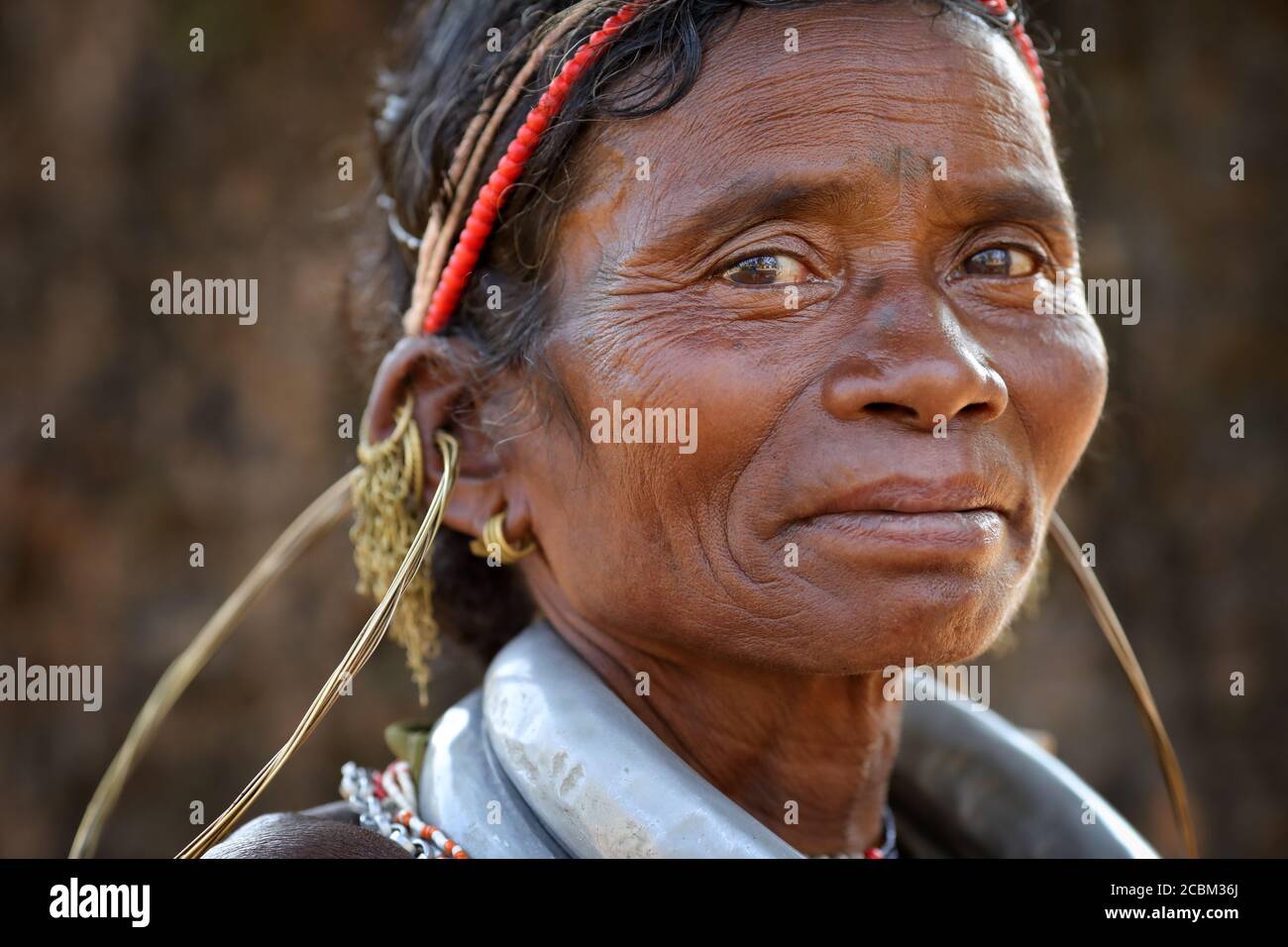 Gadaba tribal woman in a rural village near Koraput in Odisha, India. The Koraput region is well known for its tribal life and traditional culture. Stock Photo