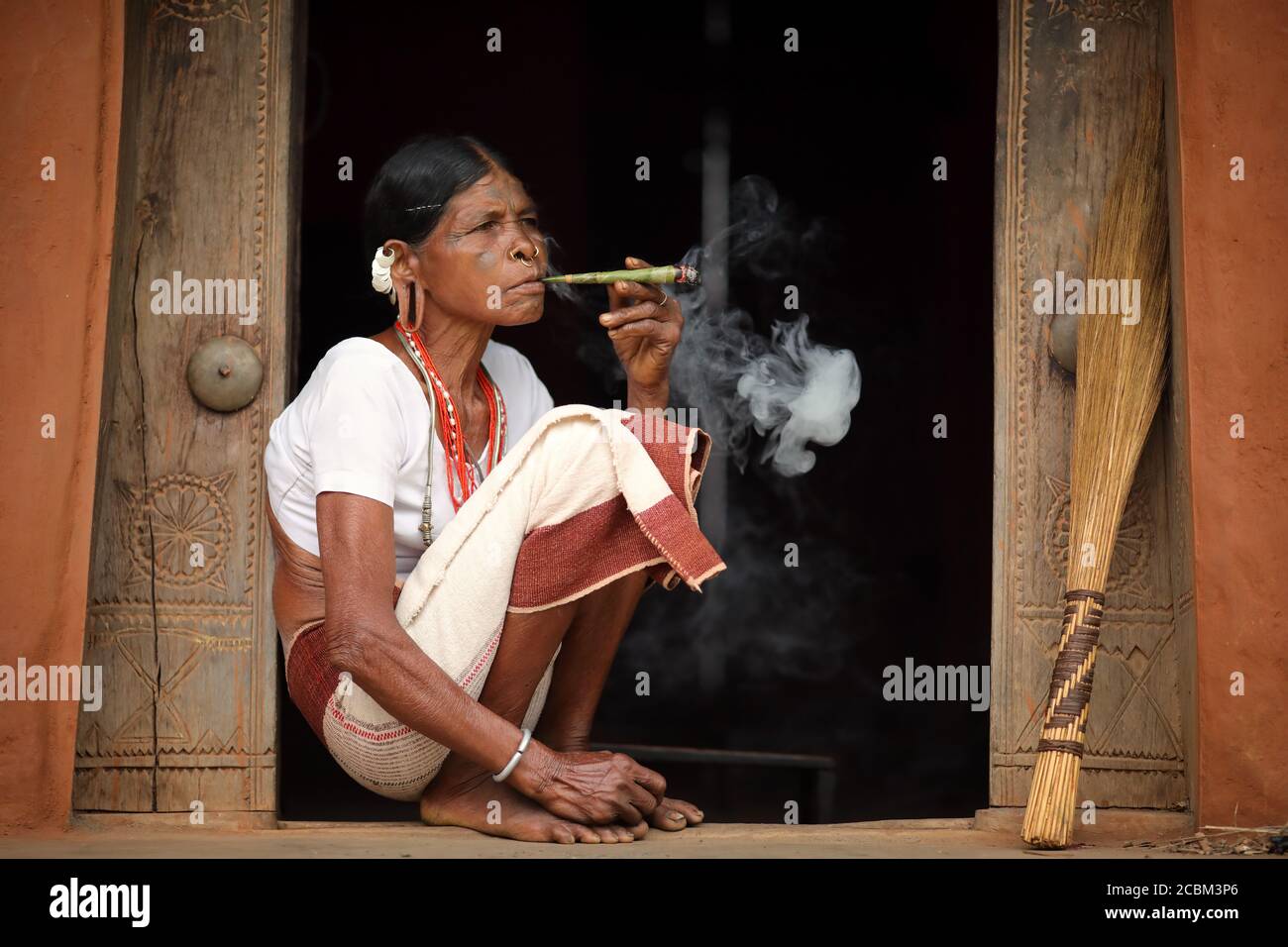 Sora tribal woman in a rural village near Gunupur in Odisha, India. Stock Photo