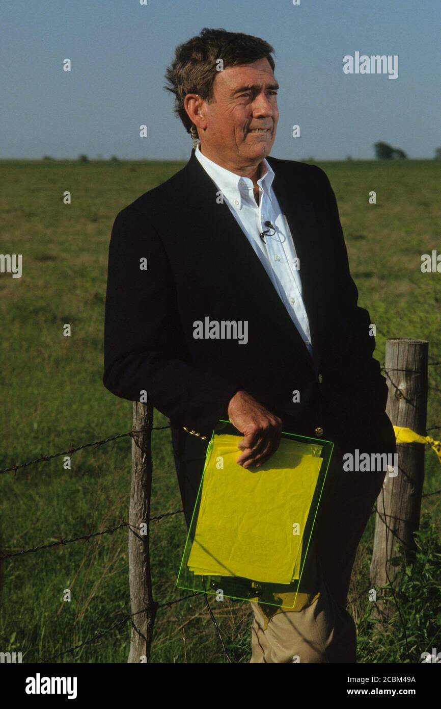 Waco, Texas USA, 1993: CBS News broadcaster Dan Rather stands ready to
