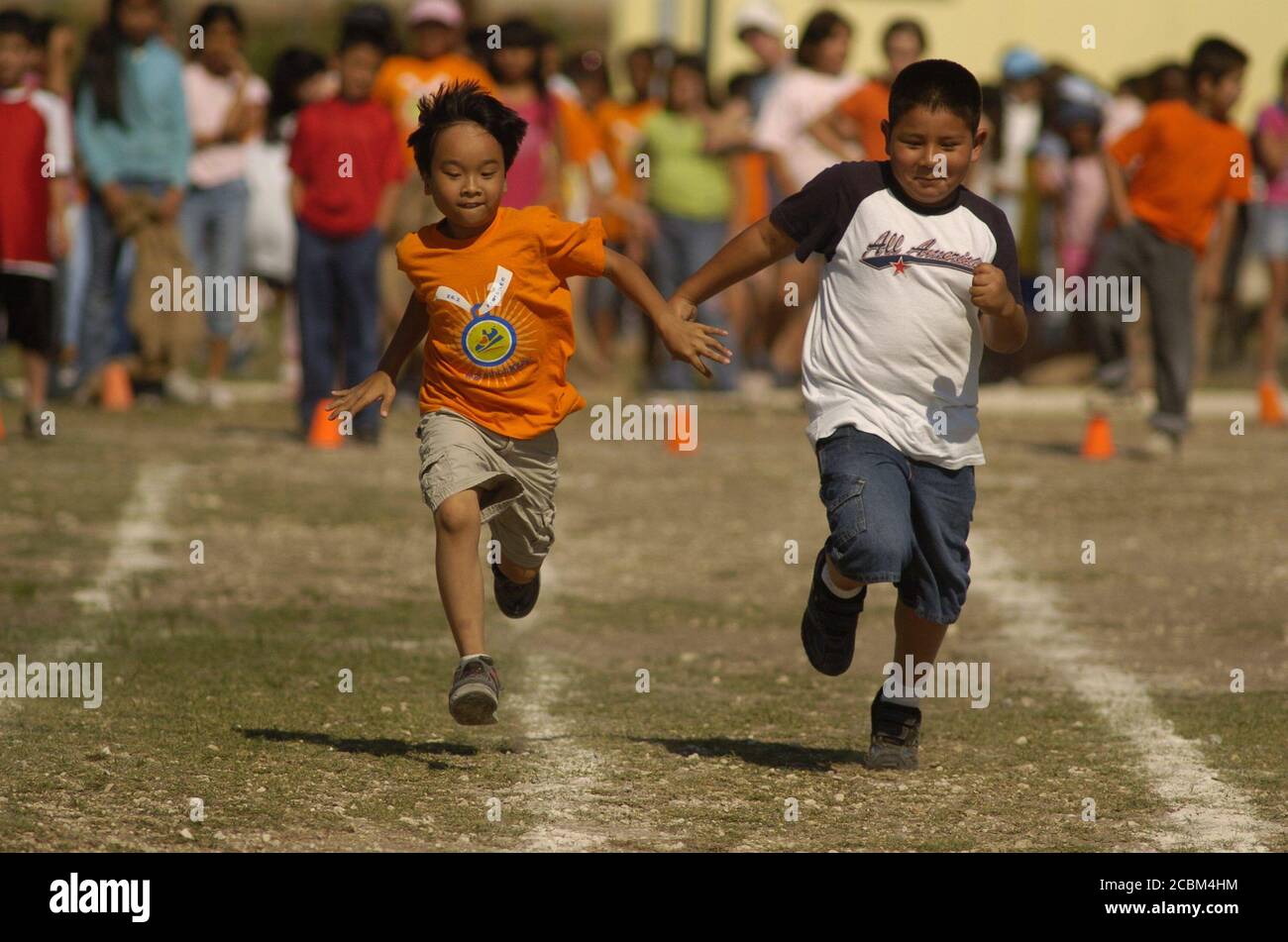 Austin, Texas USA, May 2006. Fourthgrade boys run 50yard sprints at