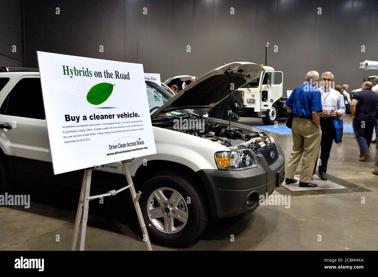 Austin, Texas: May 10, 2006: Texas Commission on Environmental Quality (TCEQ) annual trade show and convention attracts hundreds of suppliers and industry professionals to learn new methods of protecting the environment. Hybrid vehicle exhibit at the trade show includes passenger vehicles as well as commercial trucks. ©Bob Daemmrich Stock Photo