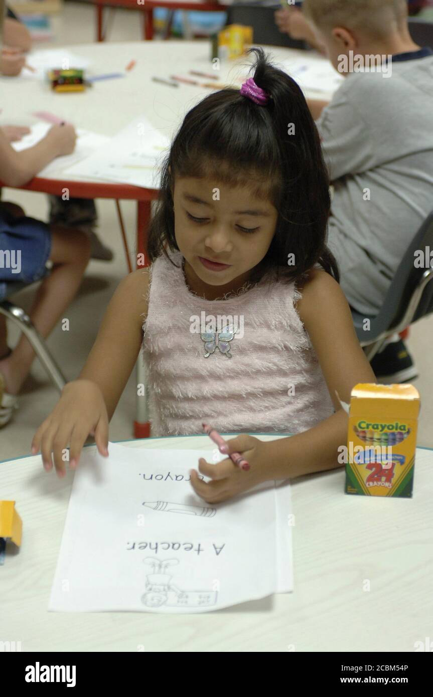 Mabank, Texas USA, August 19, 2006 Kindergarten students use crayons