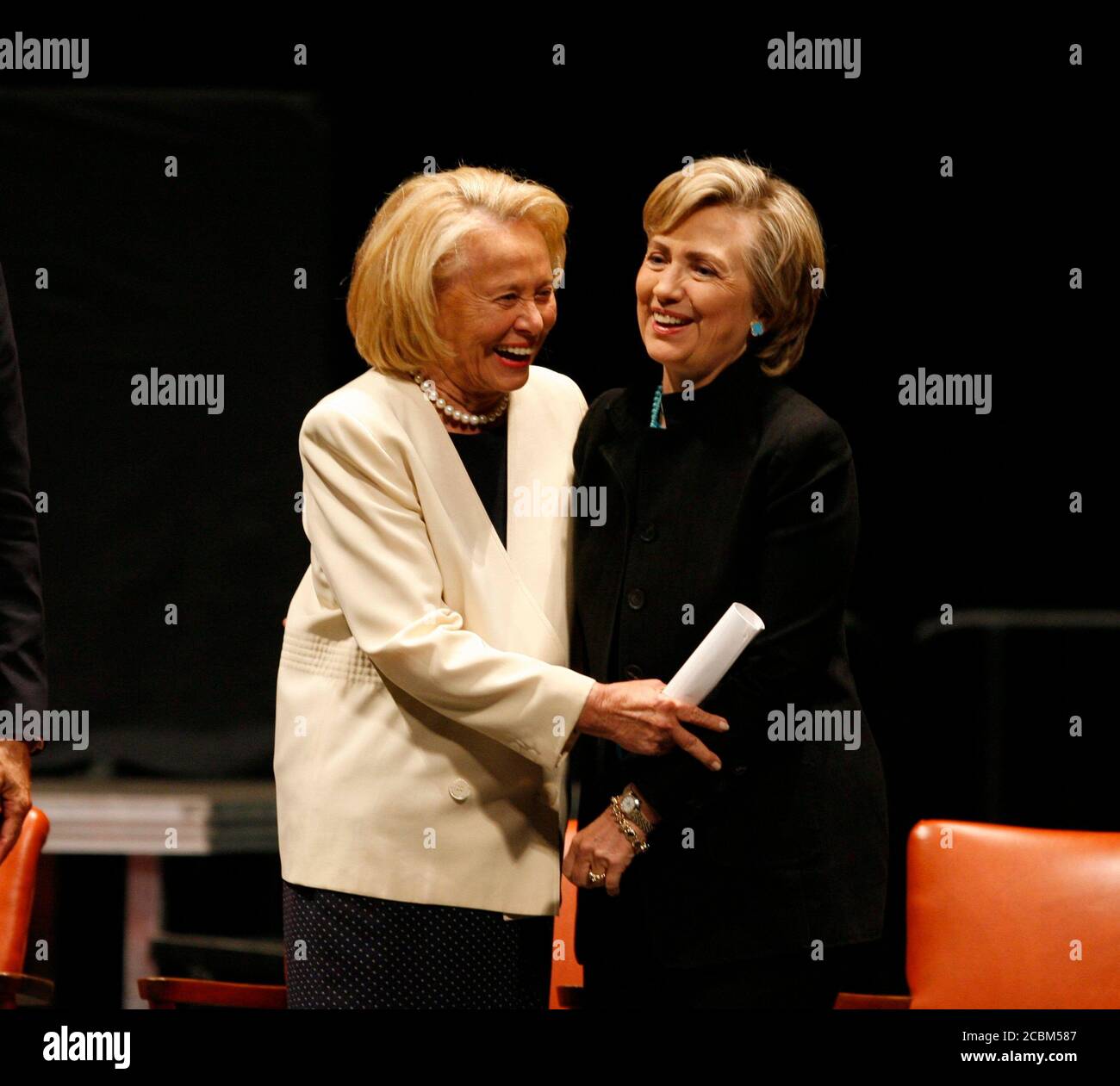 Austin, Texas USA, September 18, 2006: New York newspaper columnist Liz Smith (l) shares a laugh with former First Lady and current Sen. Hillary Rodham Clinton after both spoke at the memorial service for former Texas Governor Ann Richards, who died this week of cancer. ©Bob Daemmrich Stock Photo