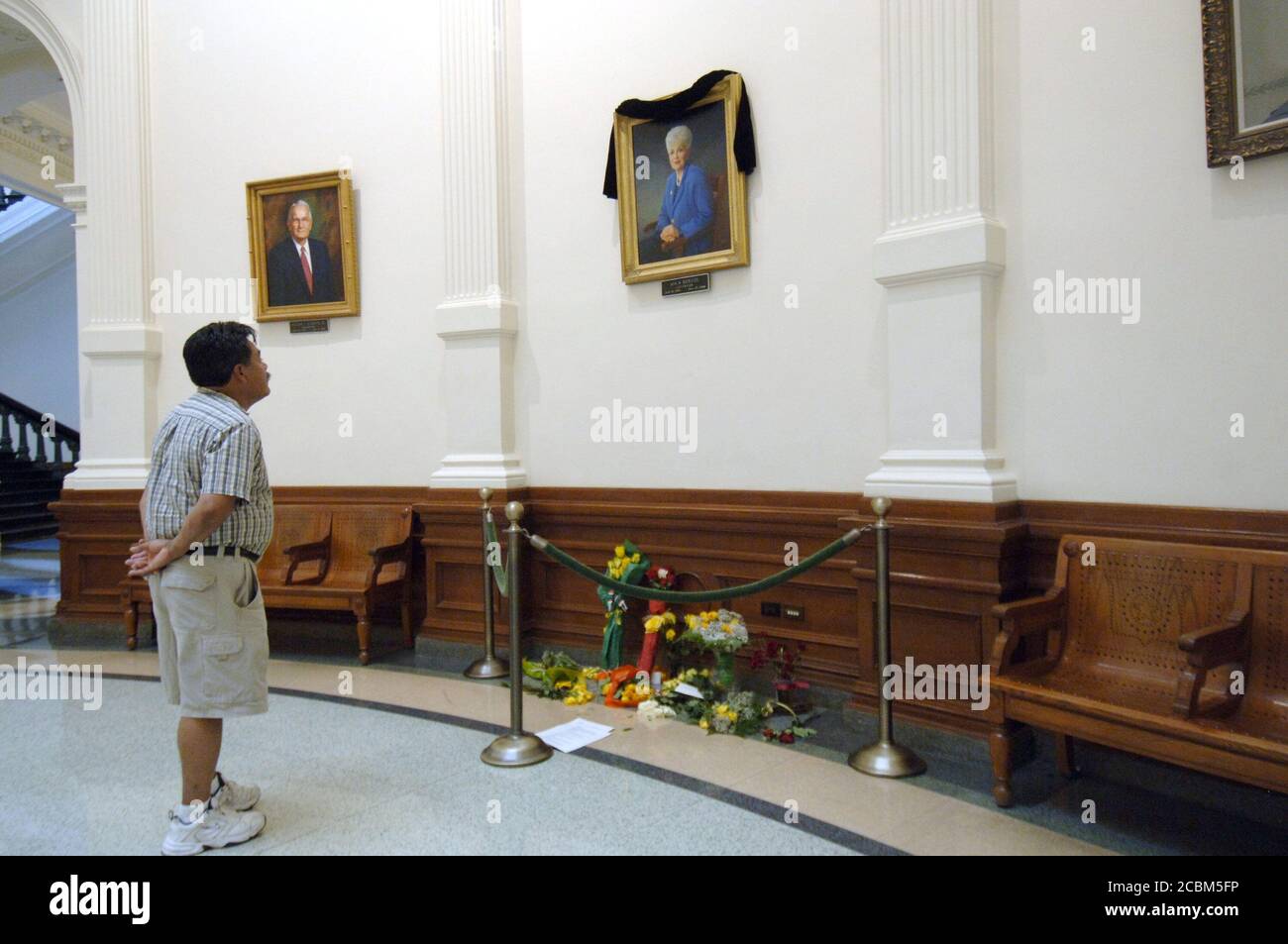 Austin, Texas September 15, 2006: Tourist view a small memorial below the official portrait of former Texas Governor Ann Richards in the rotunda of the Texas Capitol Friday afternoon. Richards,73,  known for her down-home humor and political savvy, died Wednesday in Austin. ©Marjorie Cotera / Daemmrich Photo / Stock Photo