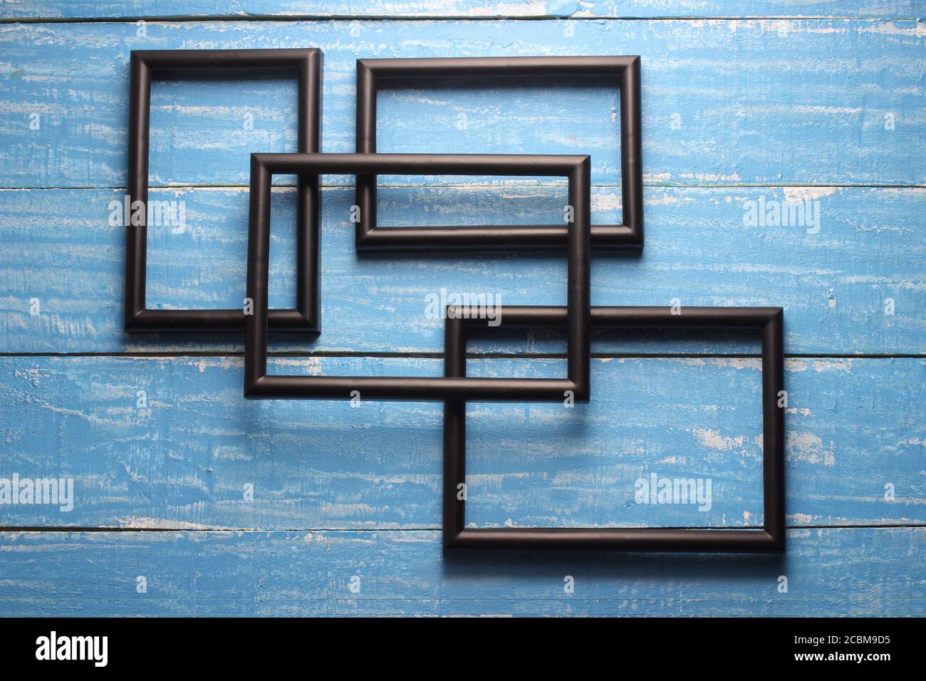 Picture Frames on Wooden Background Stock Photo