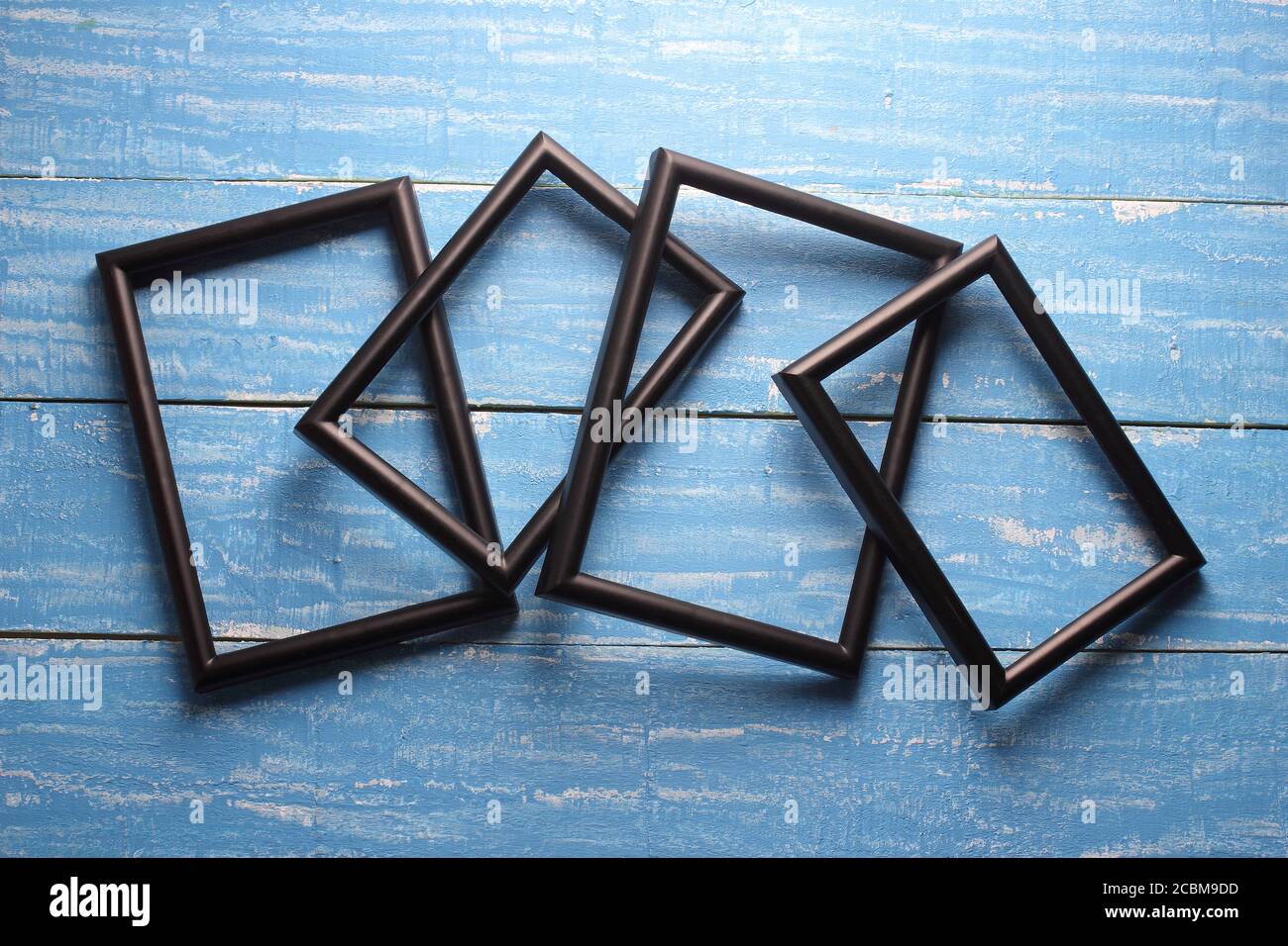 Picture Frames on Wooden Background Stock Photo