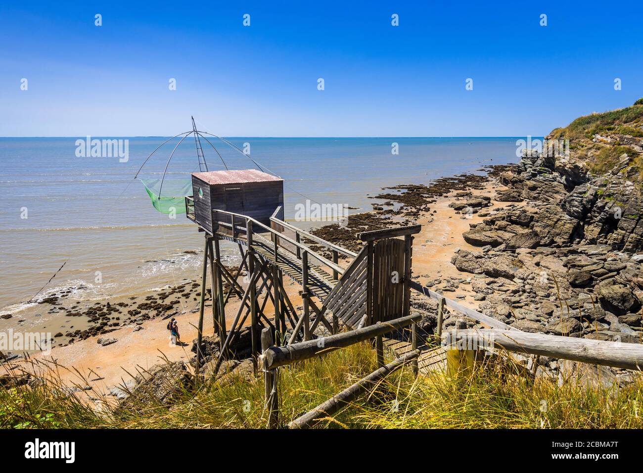 Fisherman's traditional hut and net at Plage de la Fontaine aux Bretons