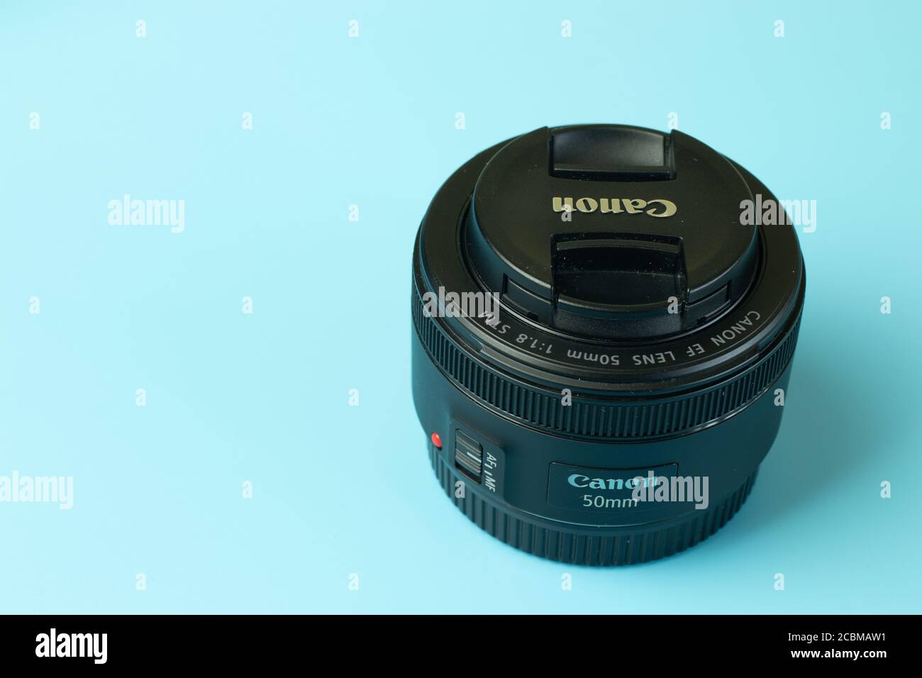 Moscow, Russia - 1 June 2020: Canon EF EOS 50 mm lens with copy space background , Illustrative Editorial Stock Photo