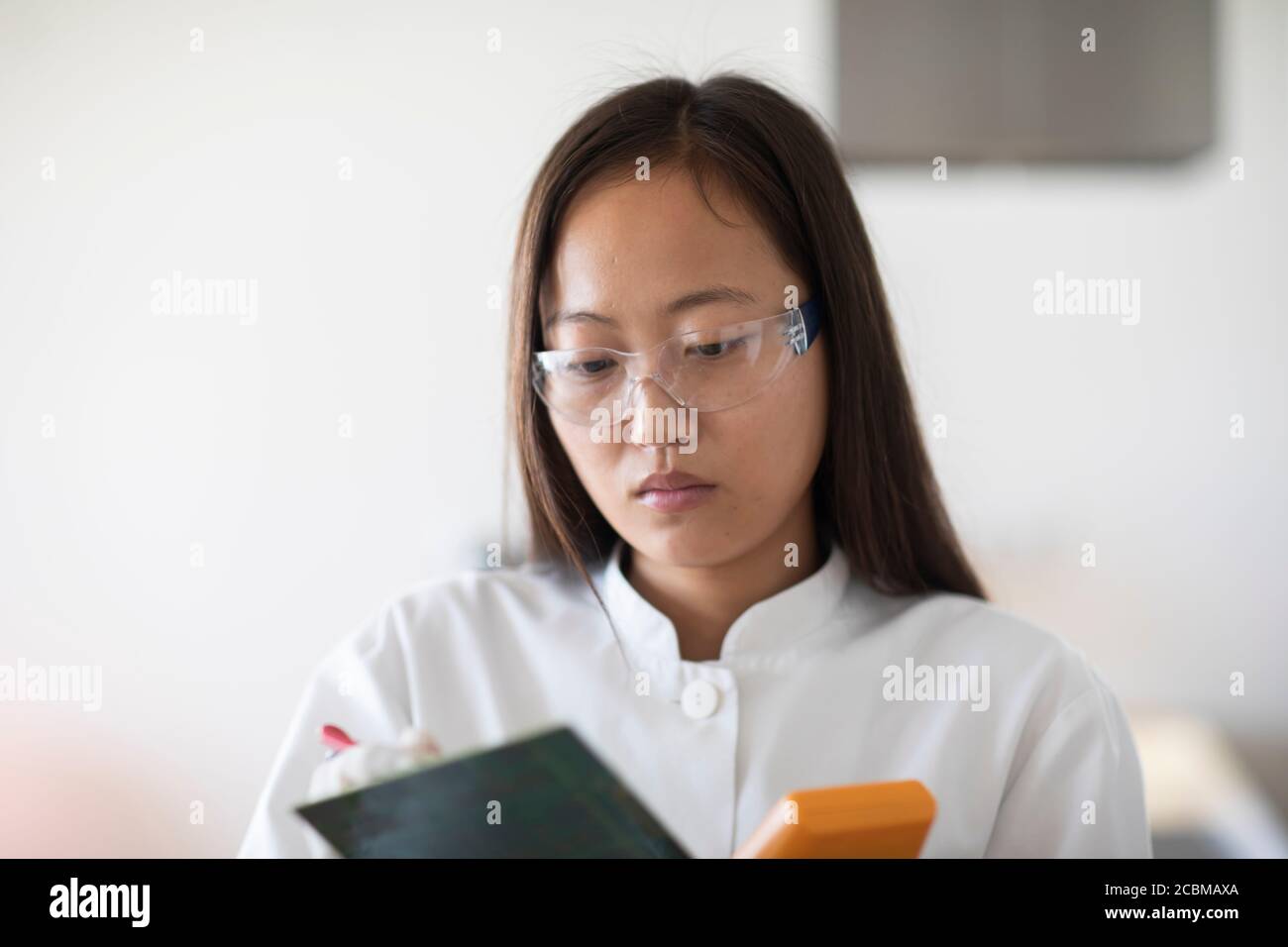 Female lab research worker in hi-res stock photography and images - Alamy