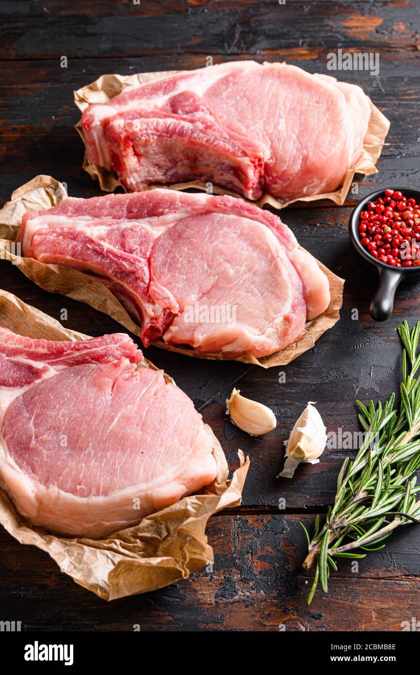 Organic Porco Iberico French Racks set over old rustic dark wood table ...