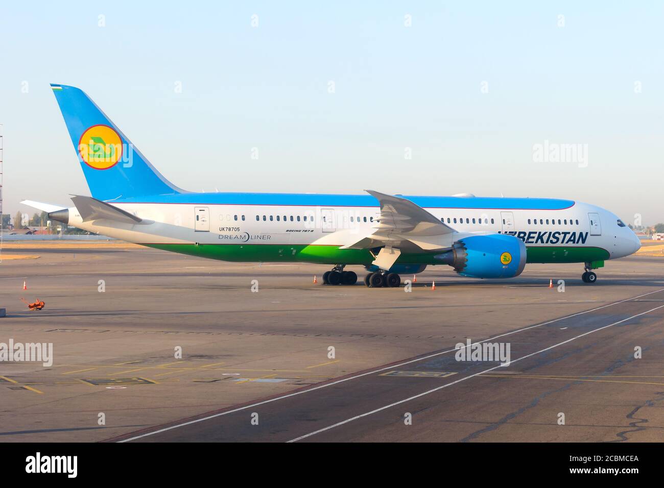 Uzbekistan Airways Boeing 787 parked at Islam Karimov Tashkent International Airport. 787-8 aircraft. Modern airplane registered as UK78705. Stock Photo