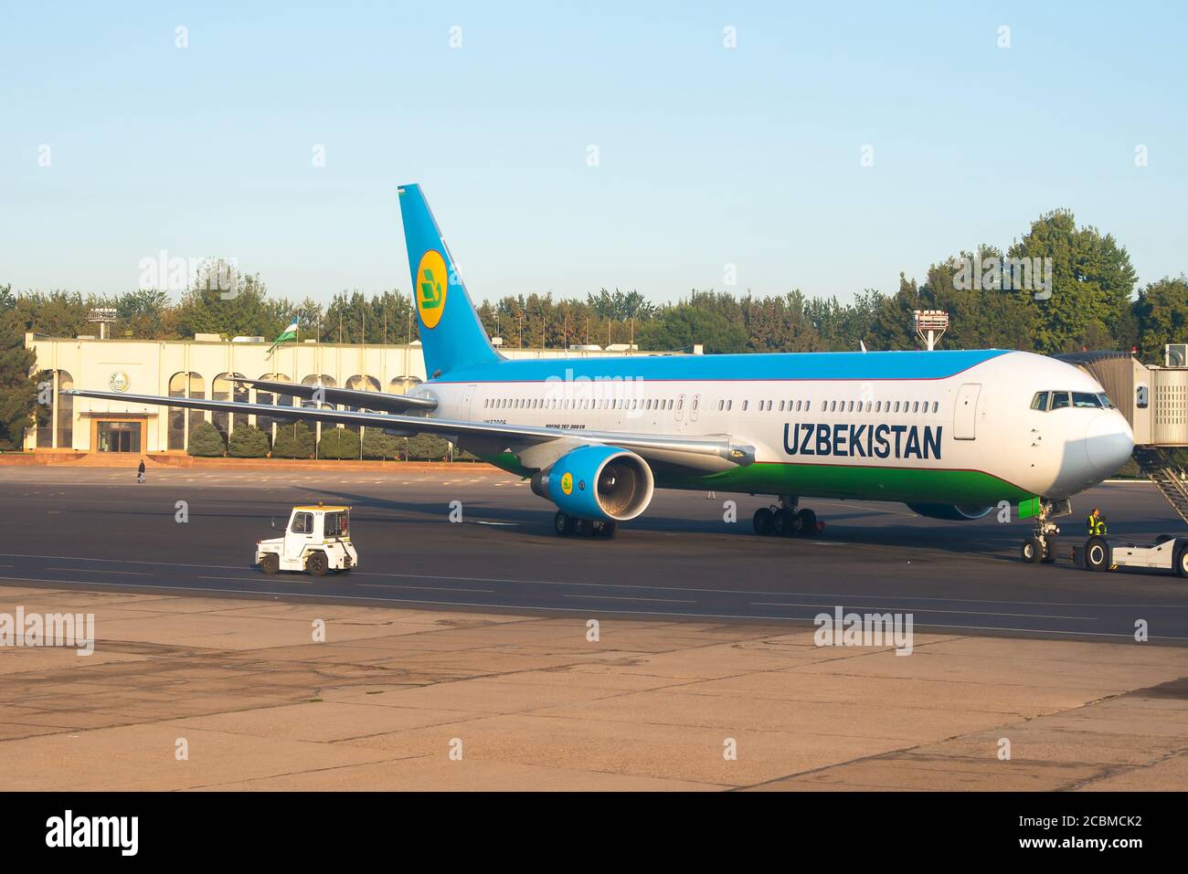 Uzbekistan Airways Boeing 767 parked at Islam Karimov Tashkent International Airport. 767-300 aircraft. Airplane registered as UK67006. Stock Photo