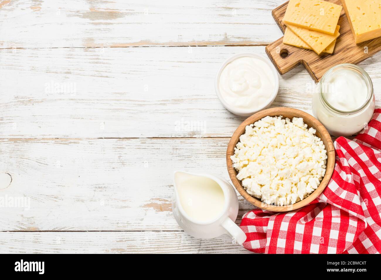 Dairy product at white wooden table. Stock Photo
