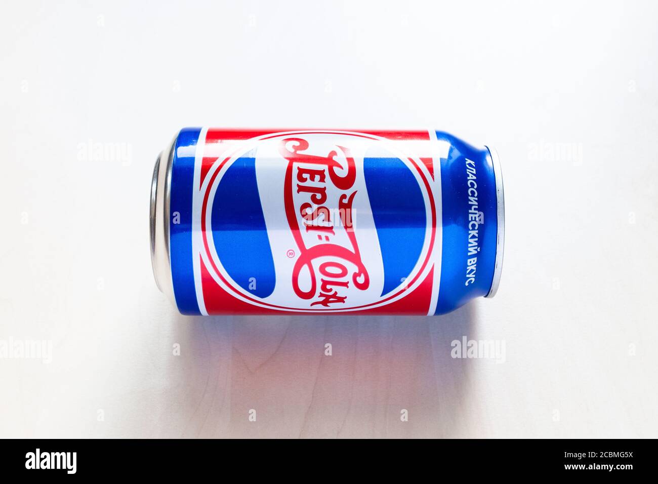 MOSCOW, RUSSIA - AUGUST 6, 2020: limited edition can of Pepsi with design from the 40s of the 20th century on lies light brown table. Pepsi is carbona Stock Photo