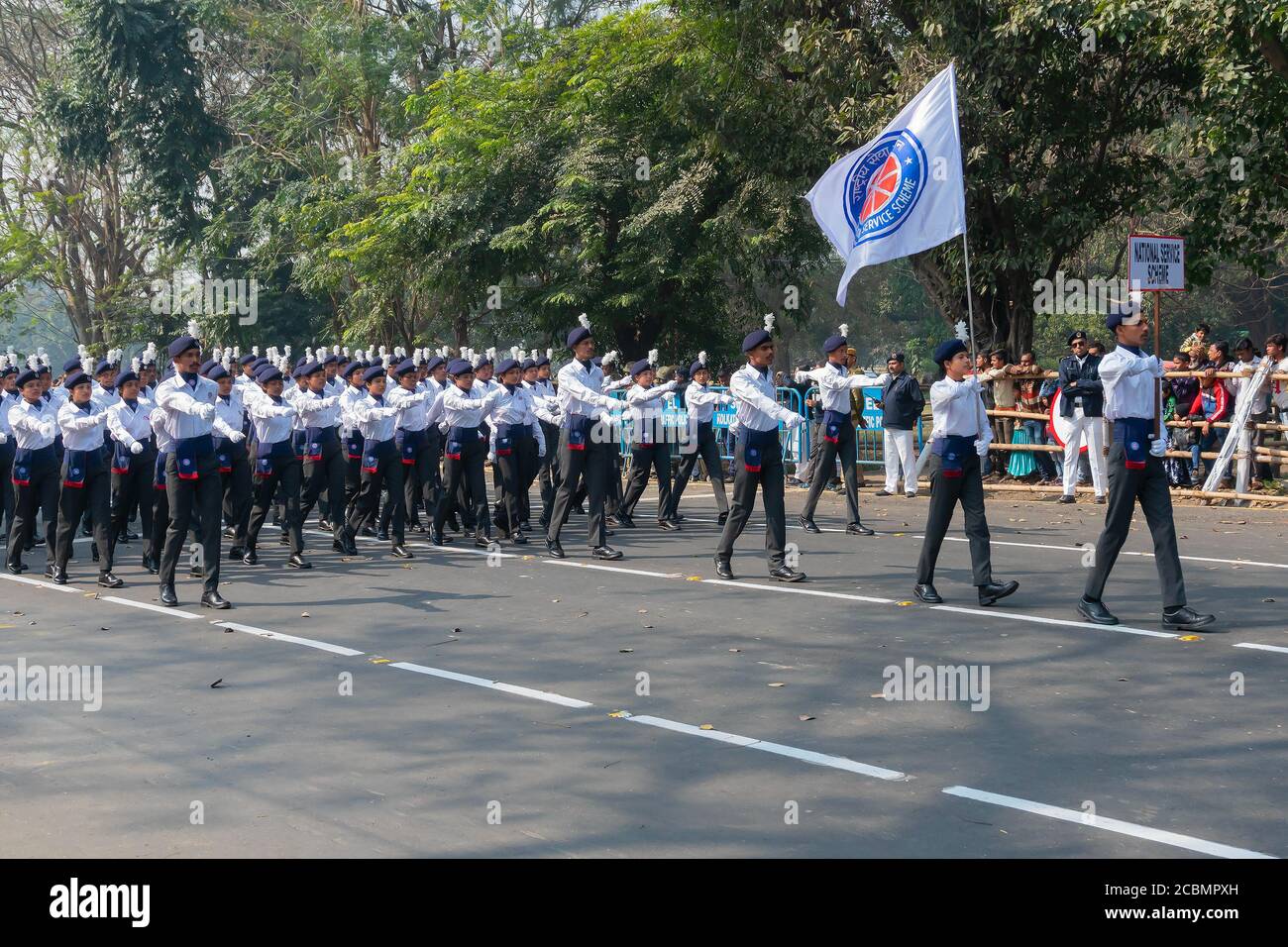 Kolkata, West Bengal, India - 26th January 2020 : India's National Service Scheme (NSS) cadets are marching past with flag, for Indian Republic day. Stock Photo