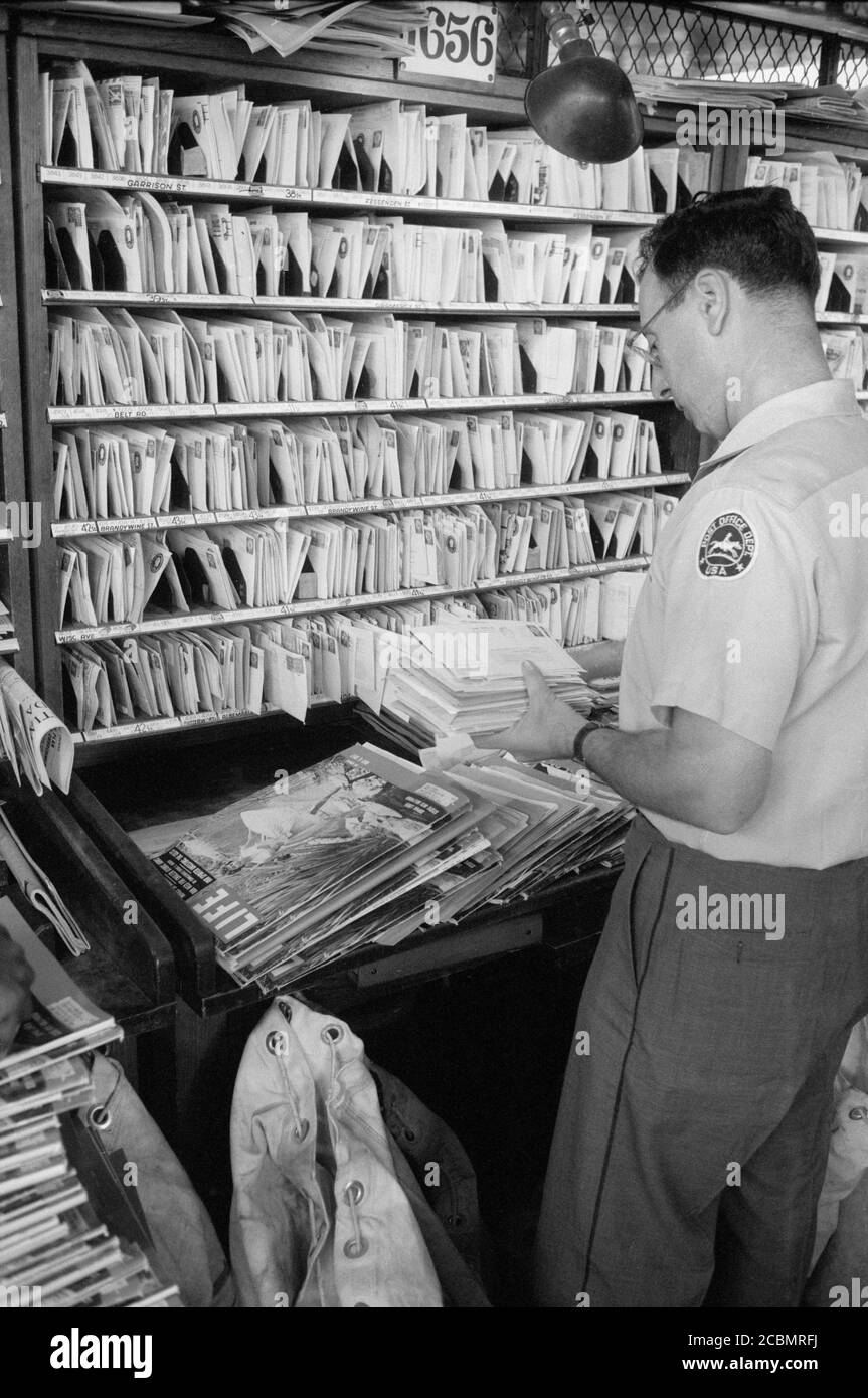 Workers sorting mail at Post Office, New York City, New York, USA, Thomas J. O'Halloran, U.S. News & World Report Magazine Photograph Collection, May 1957 Stock Photo