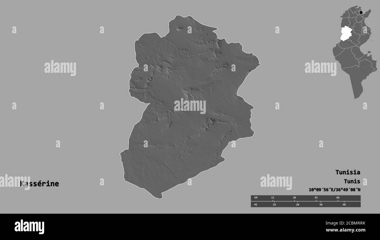 Shape of Kassérine, governorate of Tunisia, with its capital isolated on solid background. Distance scale, region preview and labels. Bilevel elevatio Stock Photo