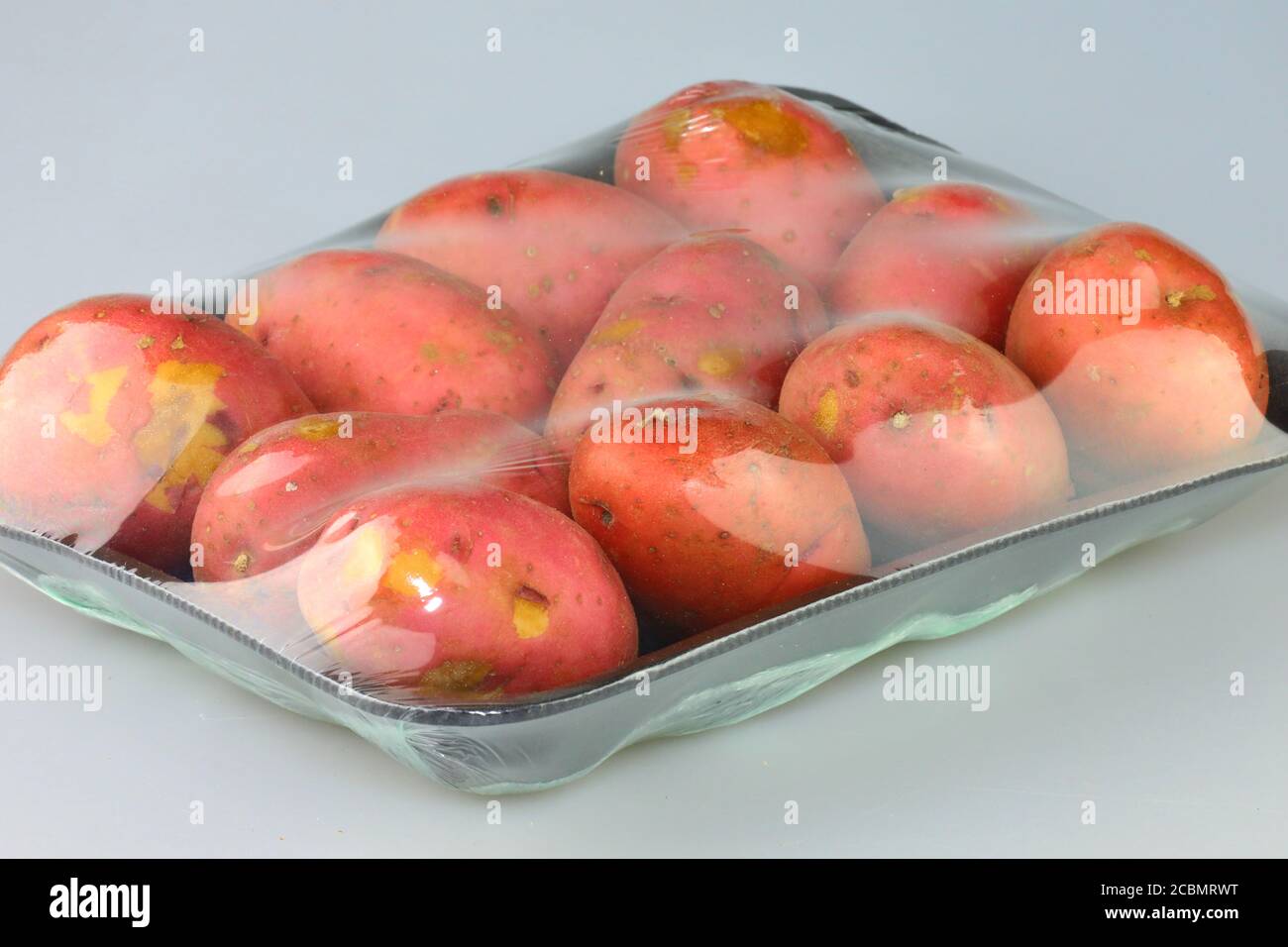 Red skin potatoes packaged Stock Photo - Alamy
