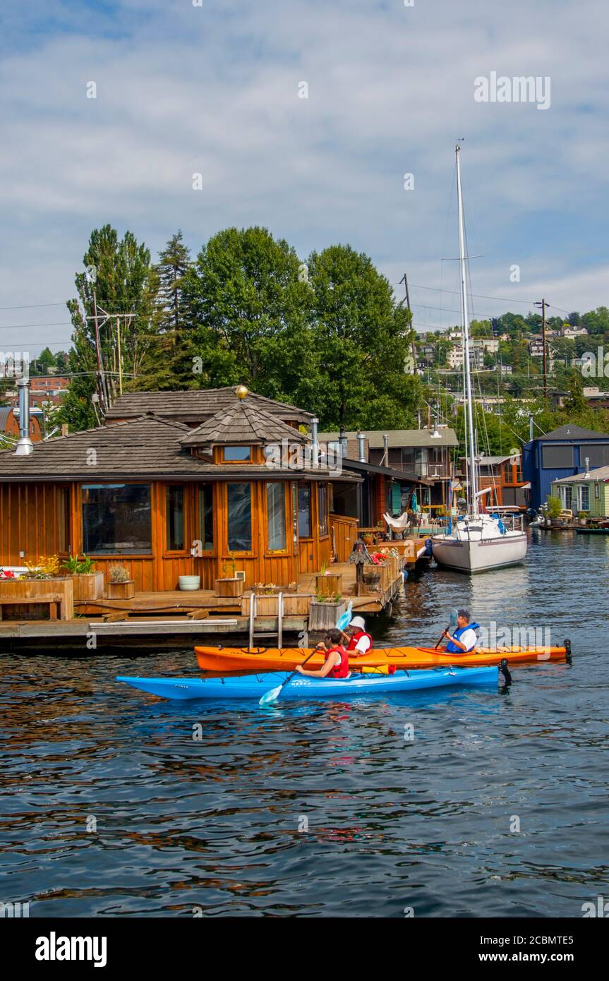 Kayaking In Seattle People kayaking along the houseboats on Lake Union in Seattle ...