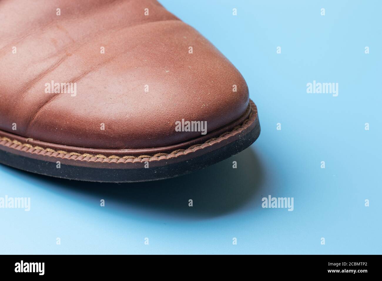 Brown leather shoe close-up with copy space Stock Photo