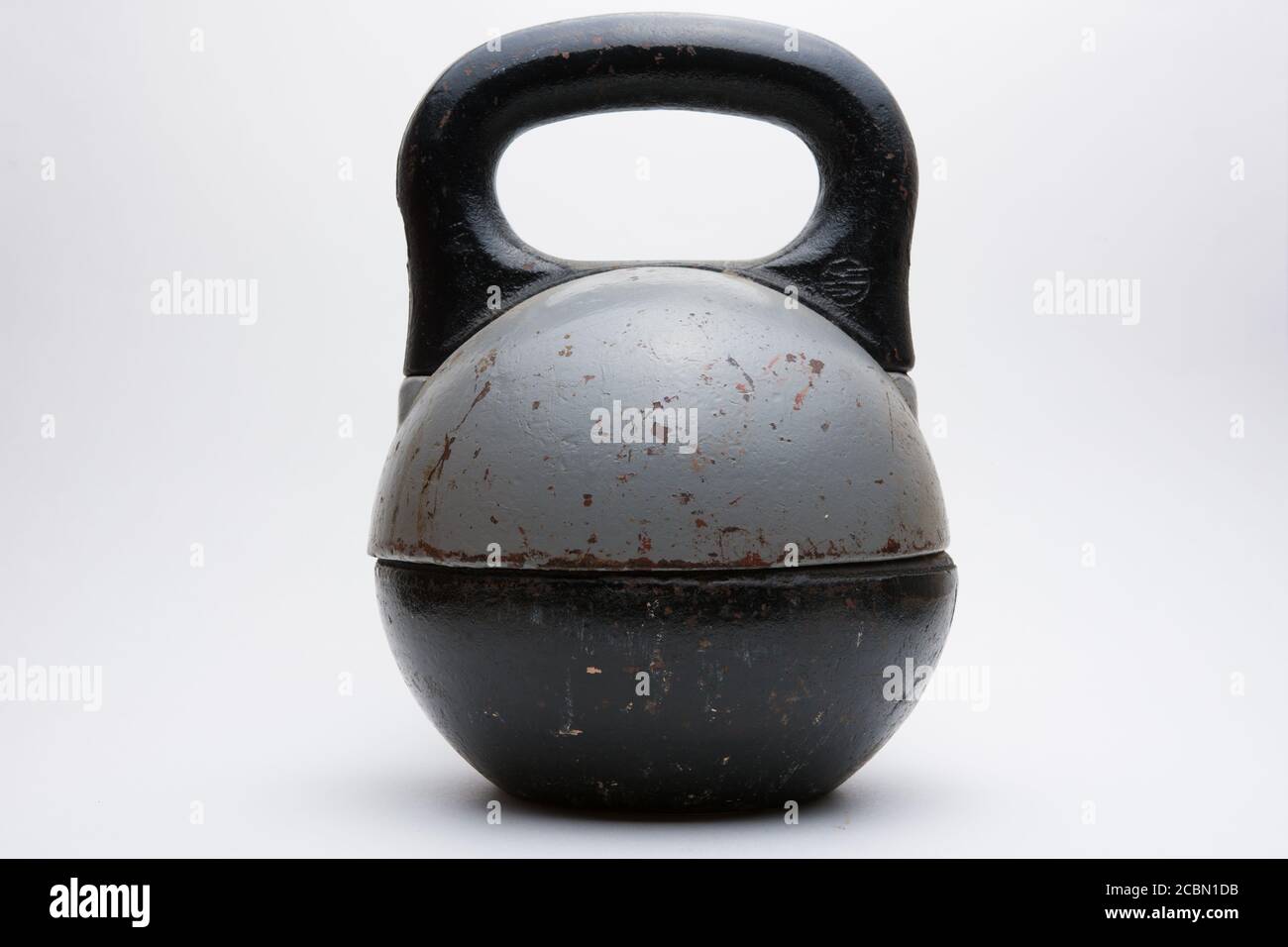 Brown gray kettlebell isolated on white background Stock Photo - Alamy