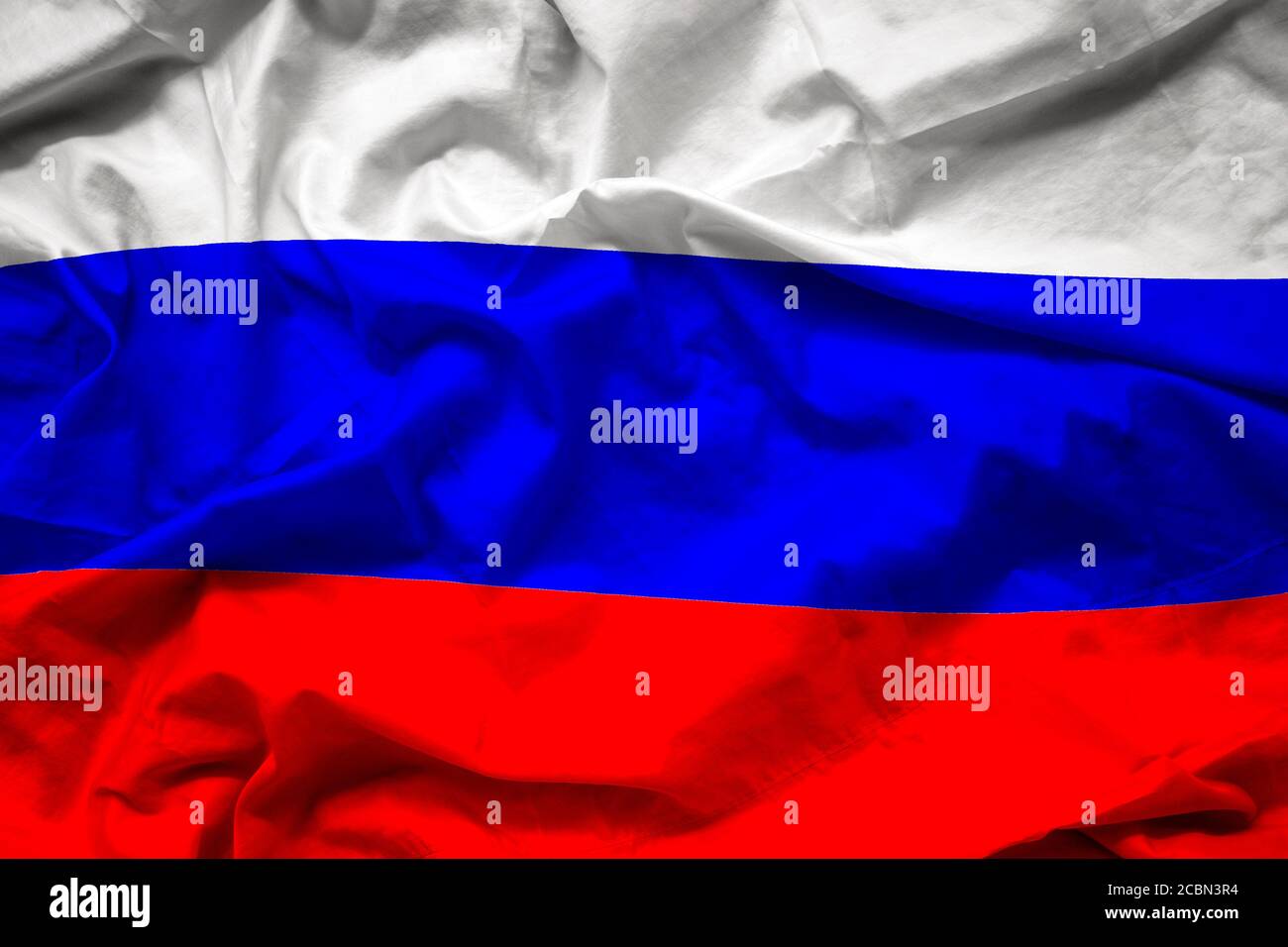 waving colorful national flag of russia , russian federation on silk texture Stock Photo