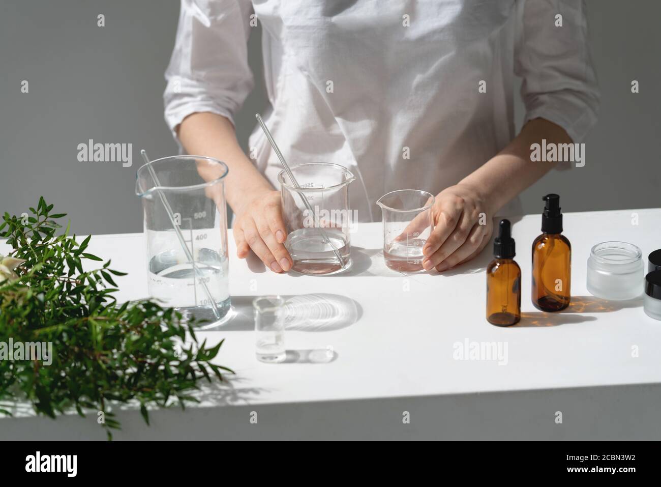 The scientist, dermatologist testing the organic natural cosmetic