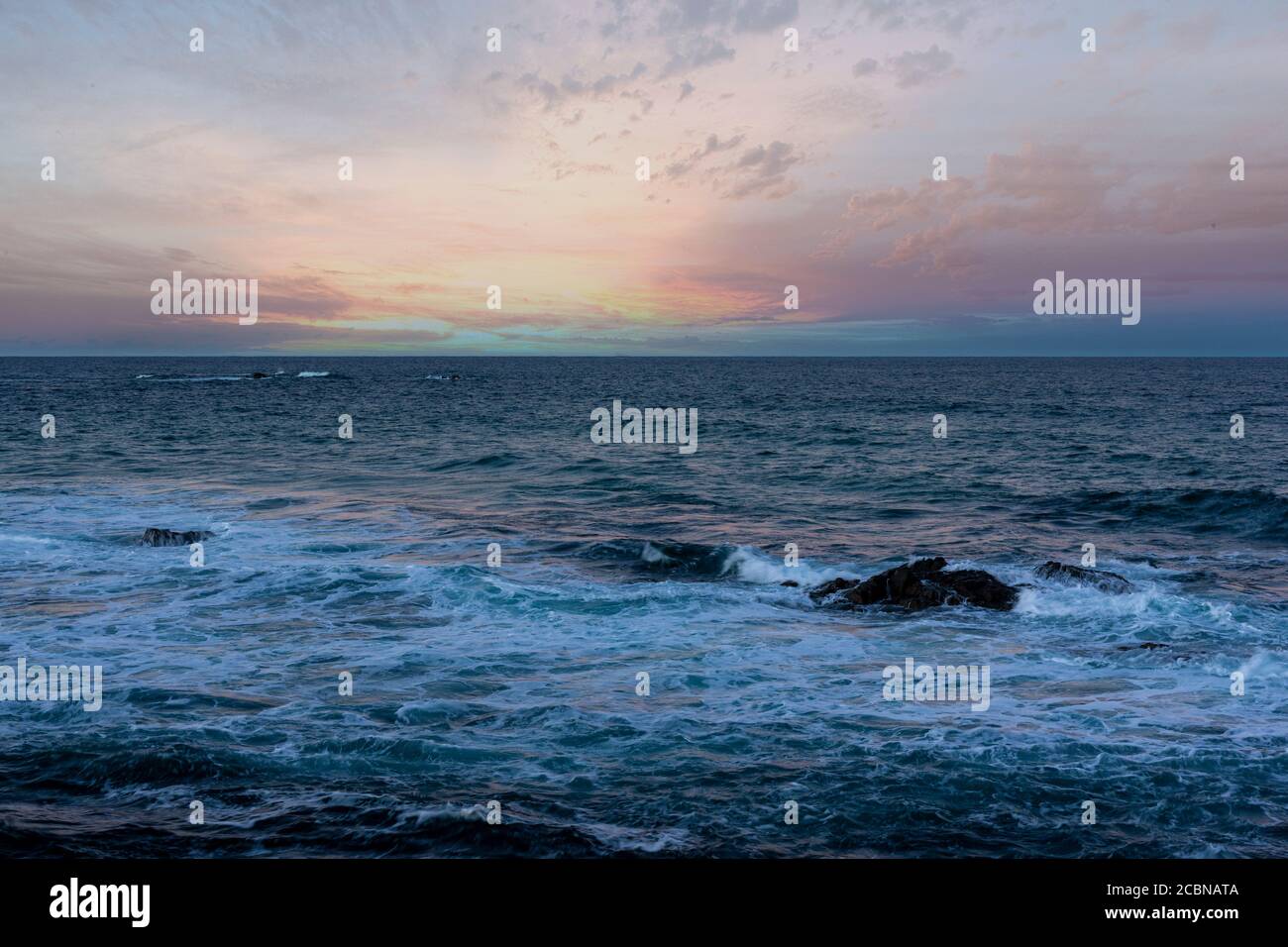 Scenic view of sunrise over the sea horizon Stock Photo - Alamy