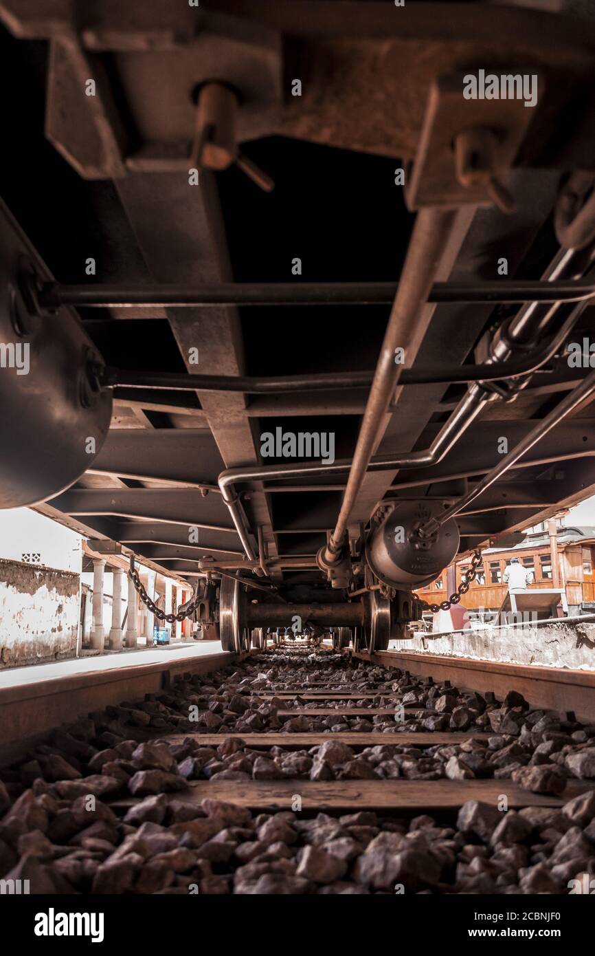 View under a freight train on a railway Stock Photo