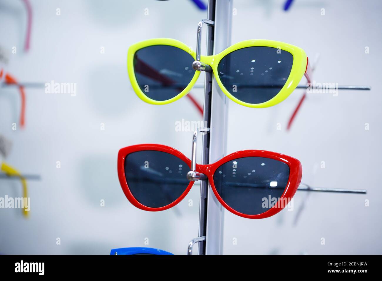 sunglasses with a colored frame for children Stock Photo