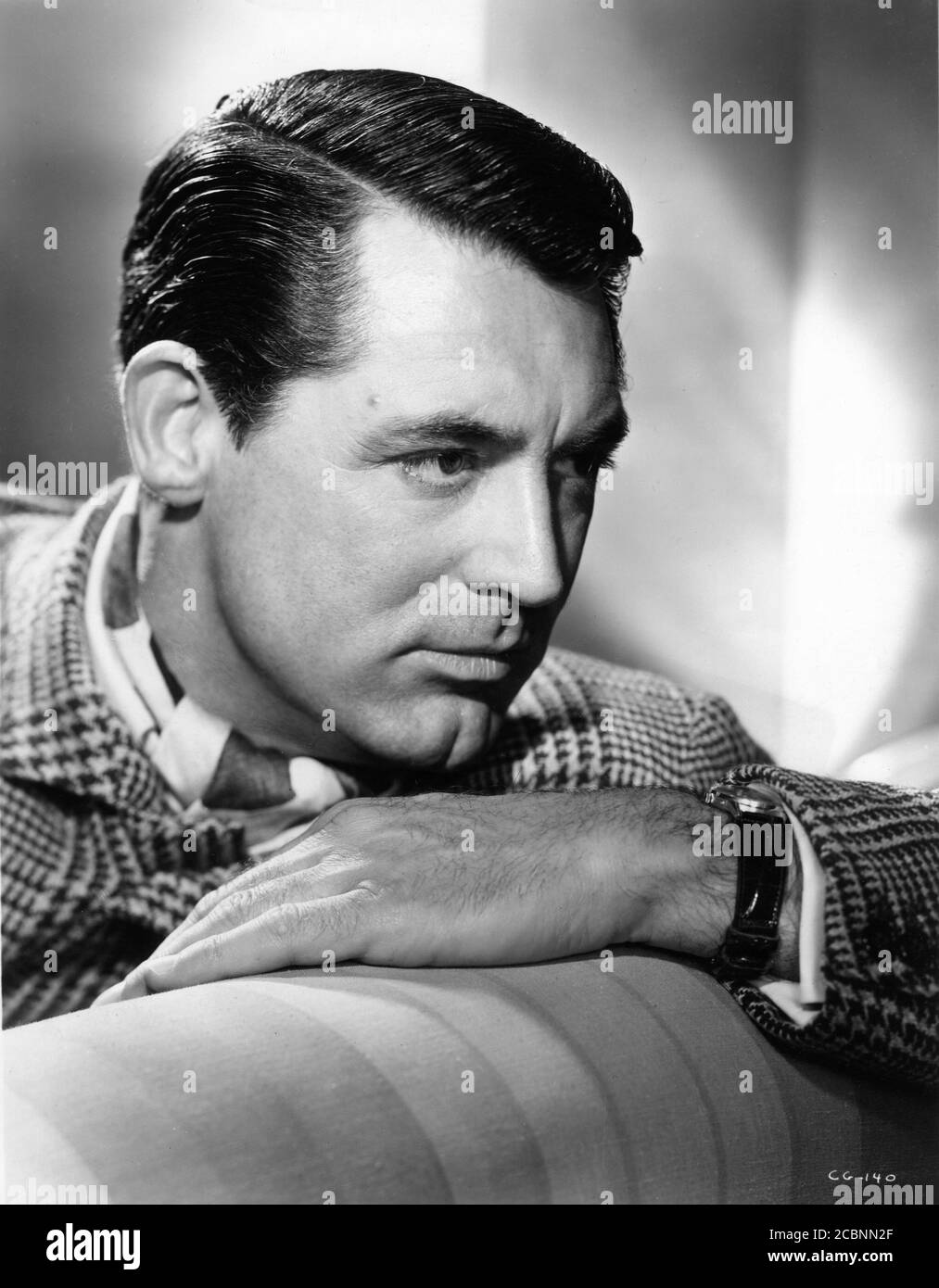 CARY GRANT Publicity Portrait for NOTORIOUS ! 1946 director ALFRED HITCHCOCK writer BEN HECHT gowns EDITH HEAD Vanguard Films / RKO Radio Pictures Stock Photo